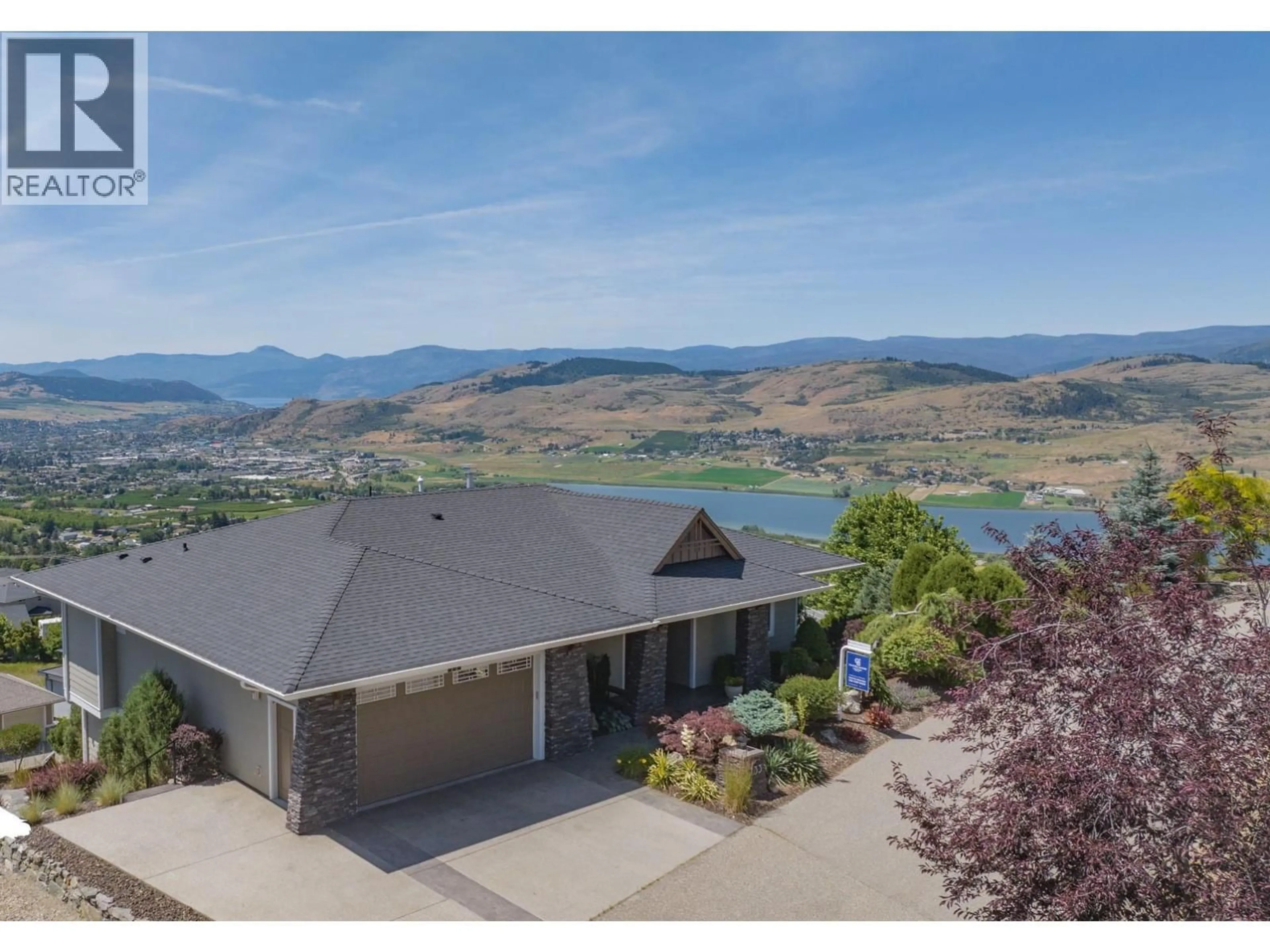 A pic from outside/outdoor area/front of a property/back of a property/a pic from drone, mountain view for 733 HART LANE, Vernon British Columbia V1B4B2