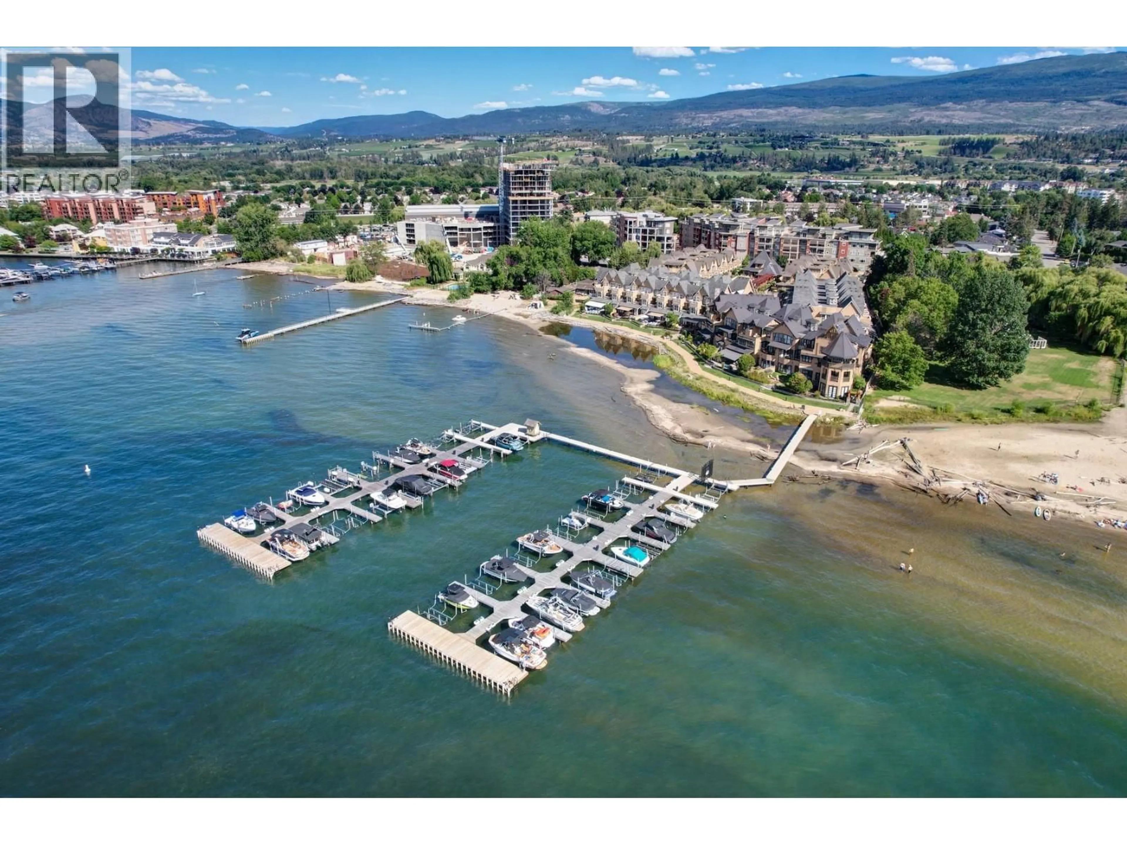 A pic from outside/outdoor area/front of a property/back of a property/a pic from drone, water/lake/river/ocean view for 211 - 3880 TRUSWELL ROAD, Kelowna British Columbia V1W5A2