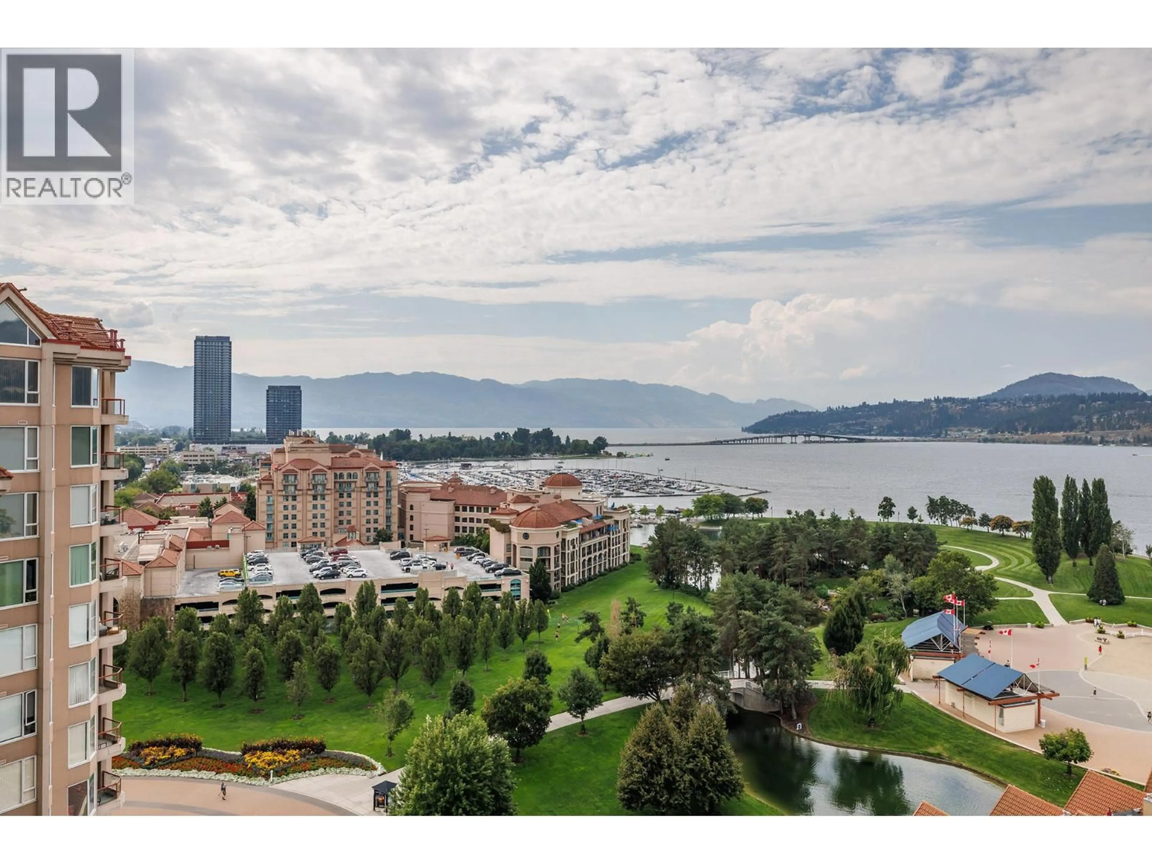 A pic from outside/outdoor area/front of a property/back of a property/a pic from drone, water/lake/river/ocean view for 1601 - 1152 SUNSET DRIVE, Kelowna British Columbia V1Y9R7