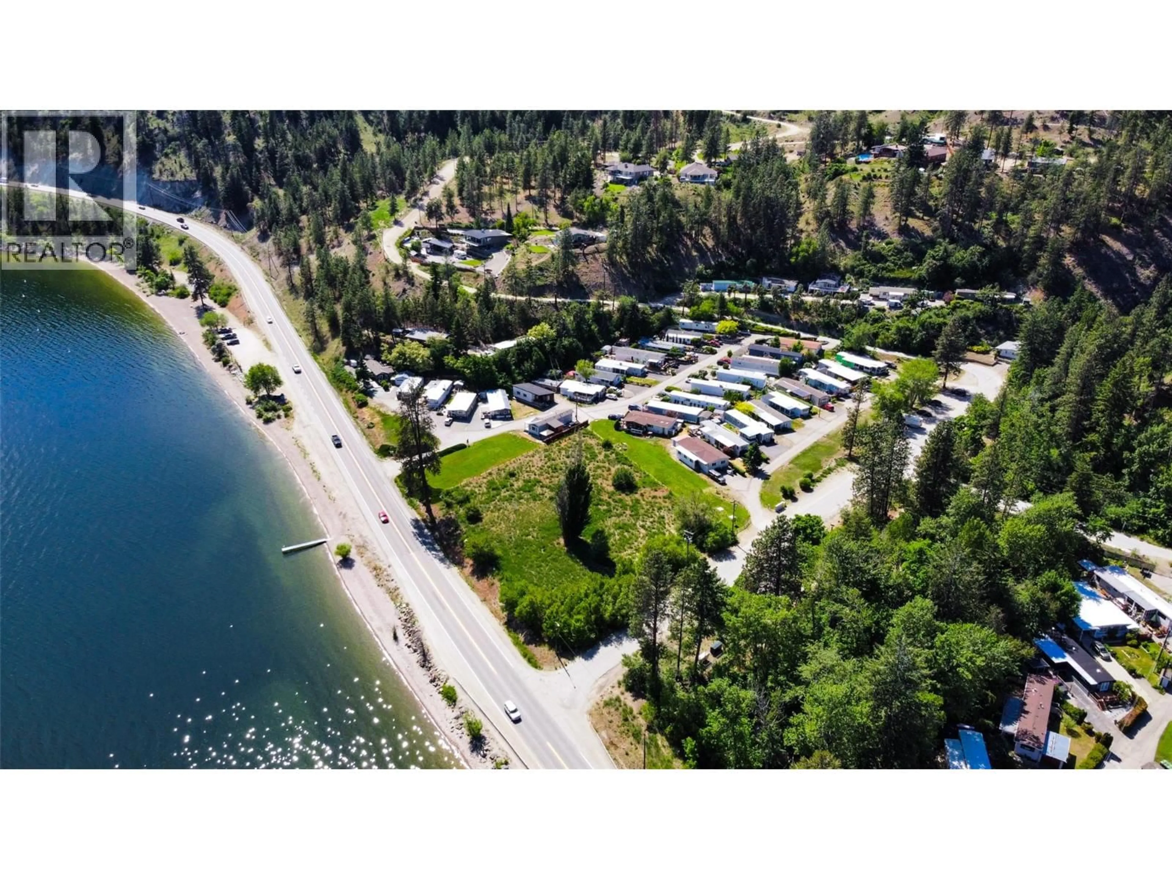A pic from outside/outdoor area/front of a property/back of a property/a pic from drone, water/lake/river/ocean view for 13 - 6711 97 HIGHWAY, Peachland British Columbia V0H1X9