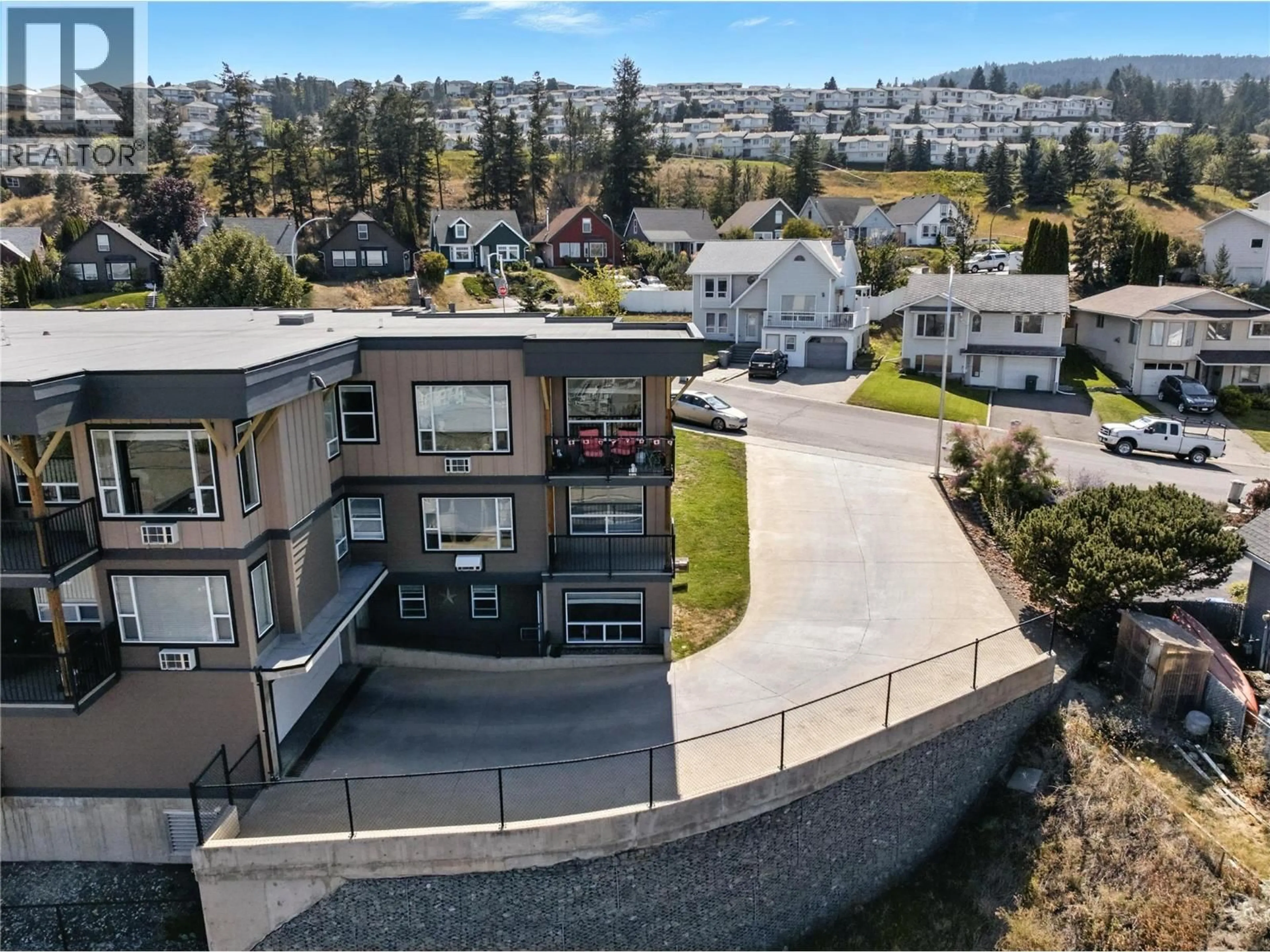A pic from outside/outdoor area/front of a property/back of a property/a pic from drone, unknown for 216 - 1200 HARRISON PLACE, Kamloops British Columbia V1S1M1