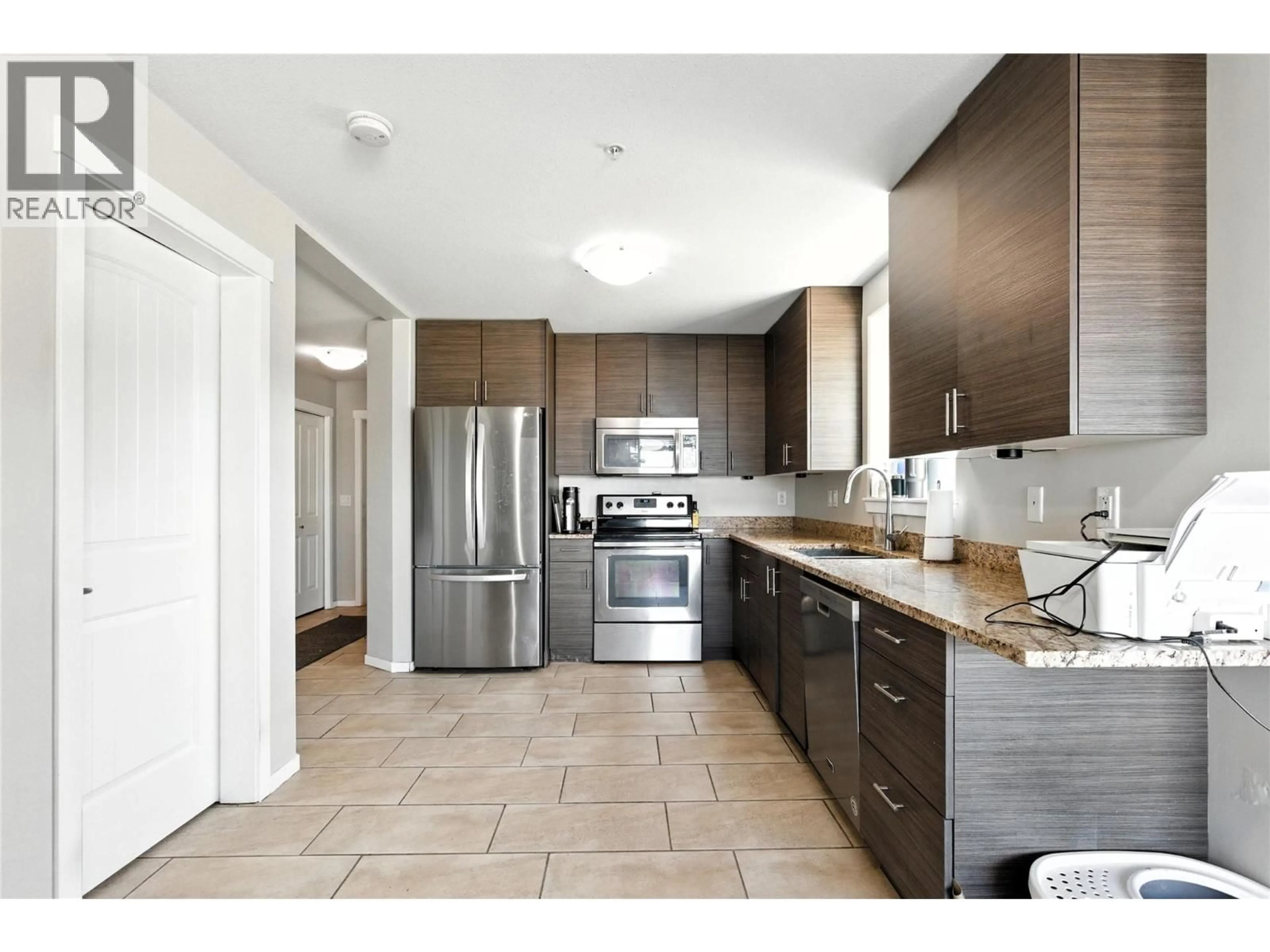 Open concept kitchen, ceramic/tile floor for 216 - 1200 HARRISON PLACE, Kamloops British Columbia V1S1M1
