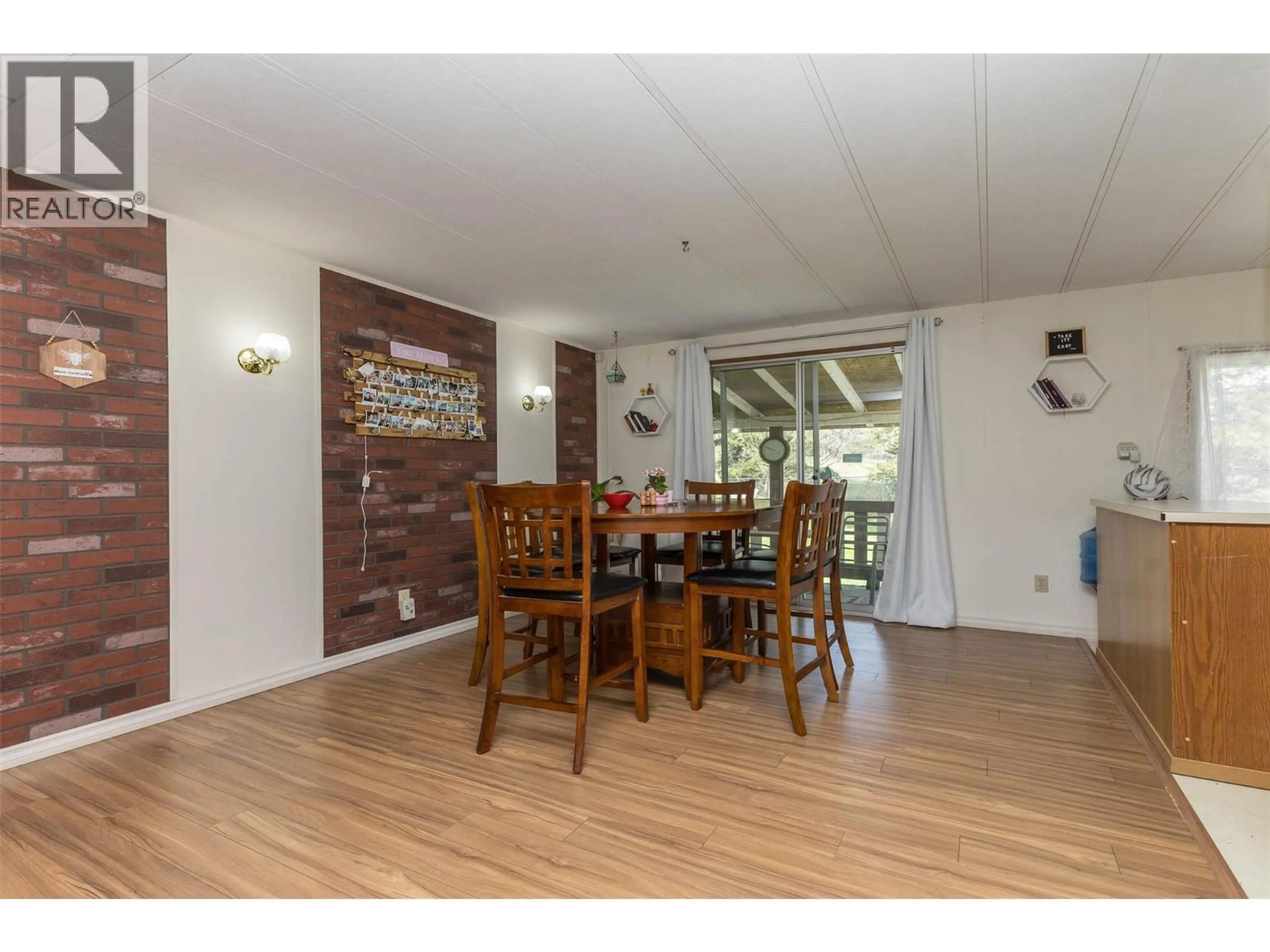 Dining room, wood/laminate floor for 167 - 2500 97B HIGHWAY SOUTHEAST, Salmon Arm British Columbia V1E1C3