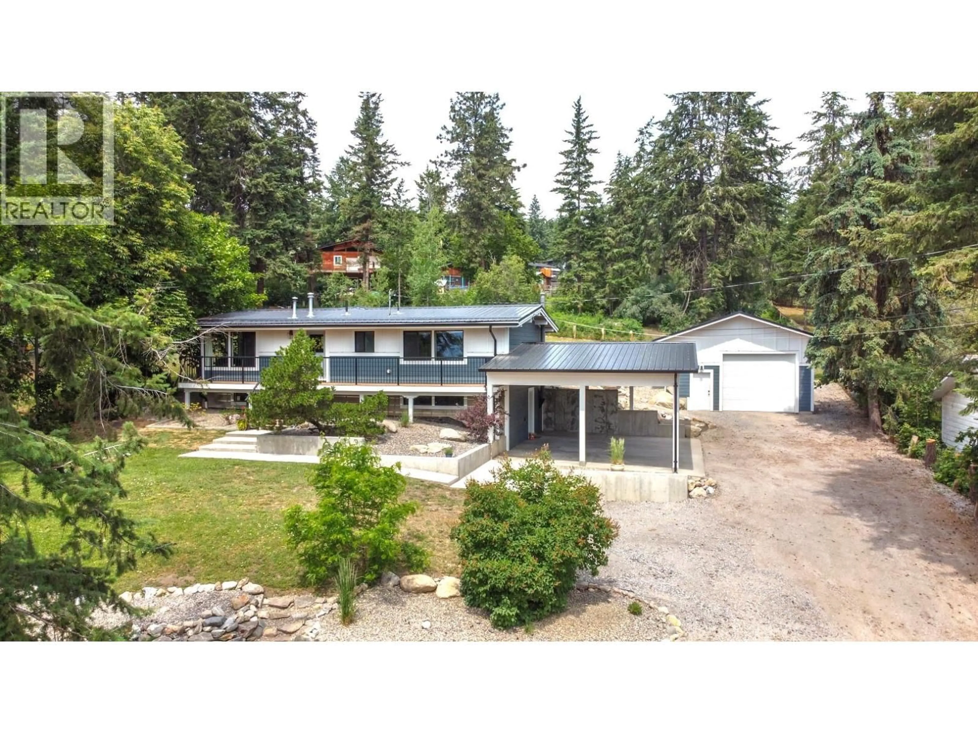A pic from outside/outdoor area/front of a property/back of a property/a pic from drone, unknown for 7629 SILVER STAR ROAD, Vernon British Columbia V1B3N7
