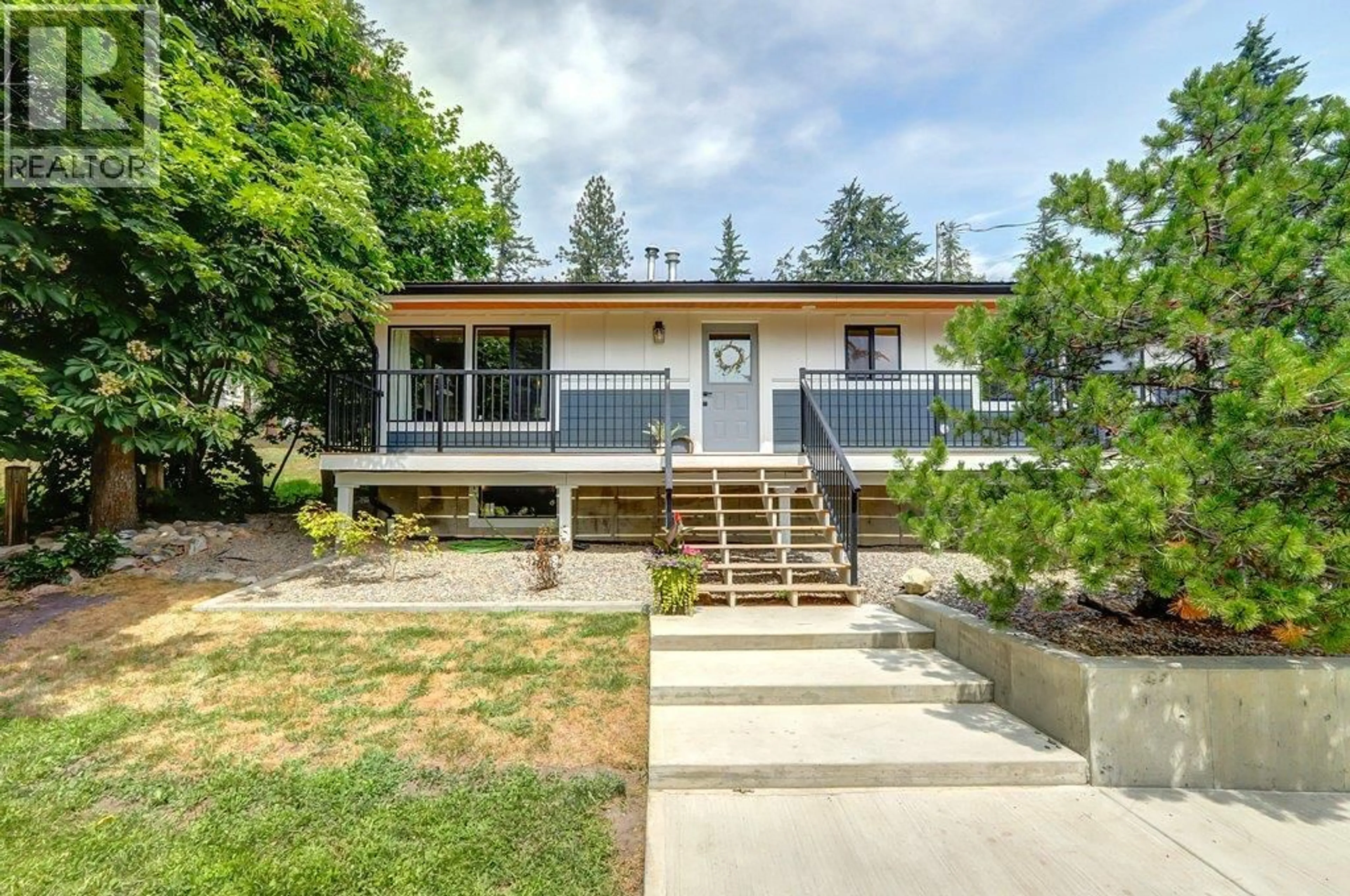 Home with vinyl exterior material, street for 7629 SILVER STAR ROAD, Vernon British Columbia V1B3N7