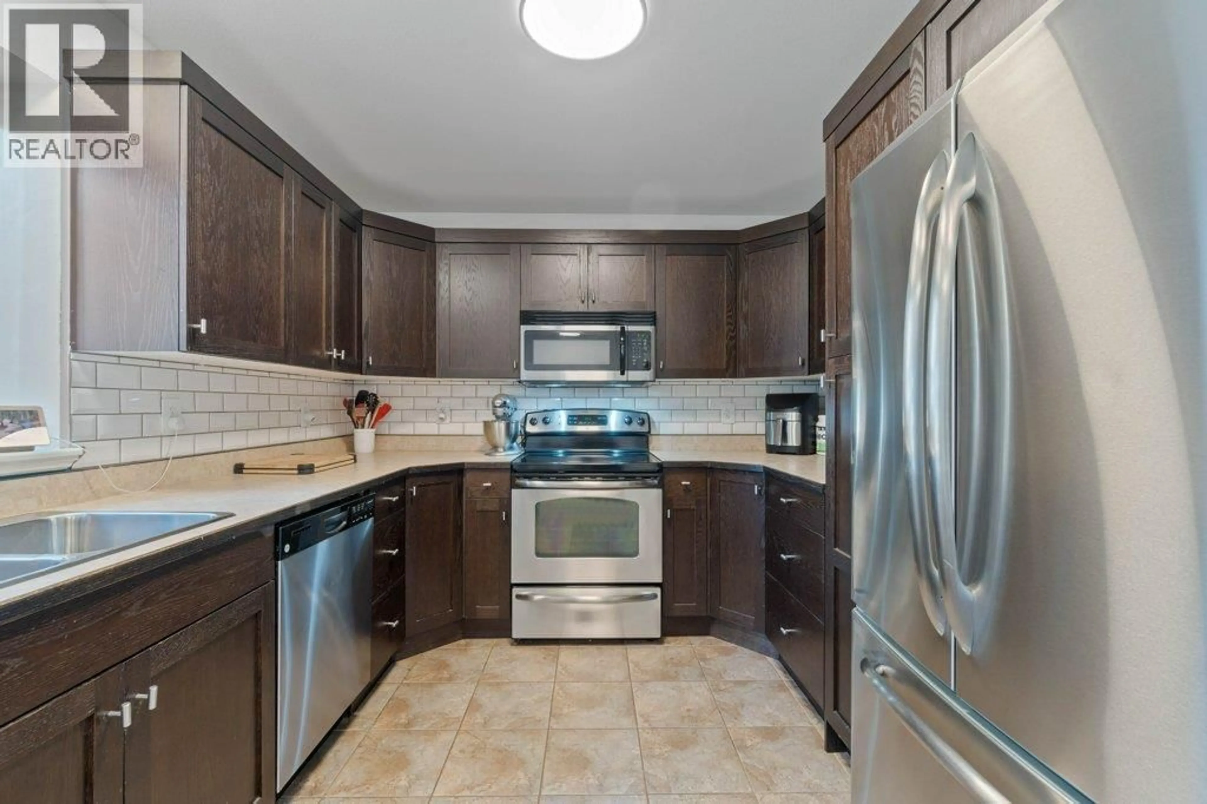 Standard kitchen, ceramic/tile floor for 102 - 1449 1 AVENUE NORTHEAST, Salmon Arm British Columbia V1E0C4