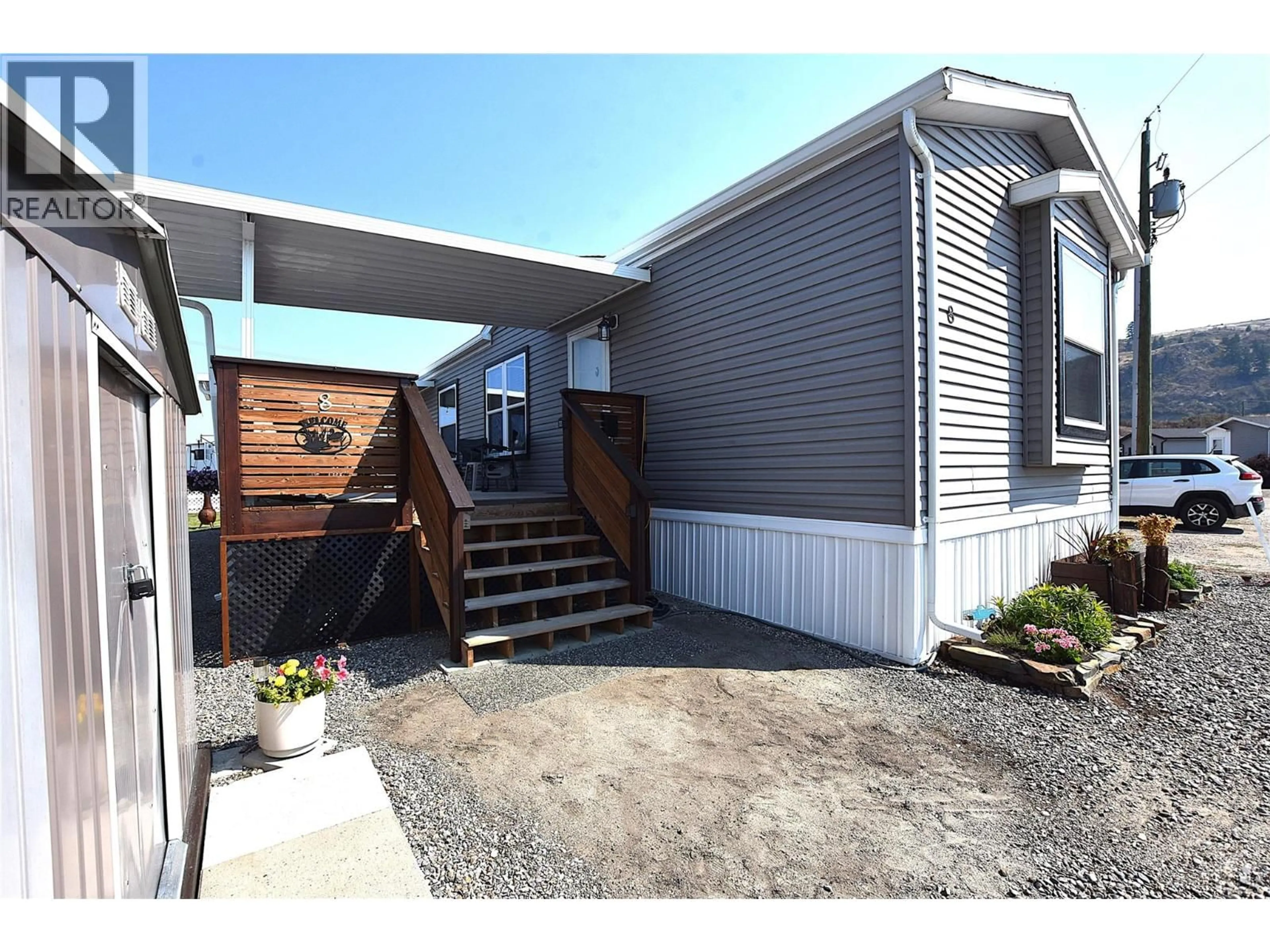 Home with vinyl exterior material, street for 8 - 61 ANTOINE ROAD, Vernon British Columbia V1H2A3