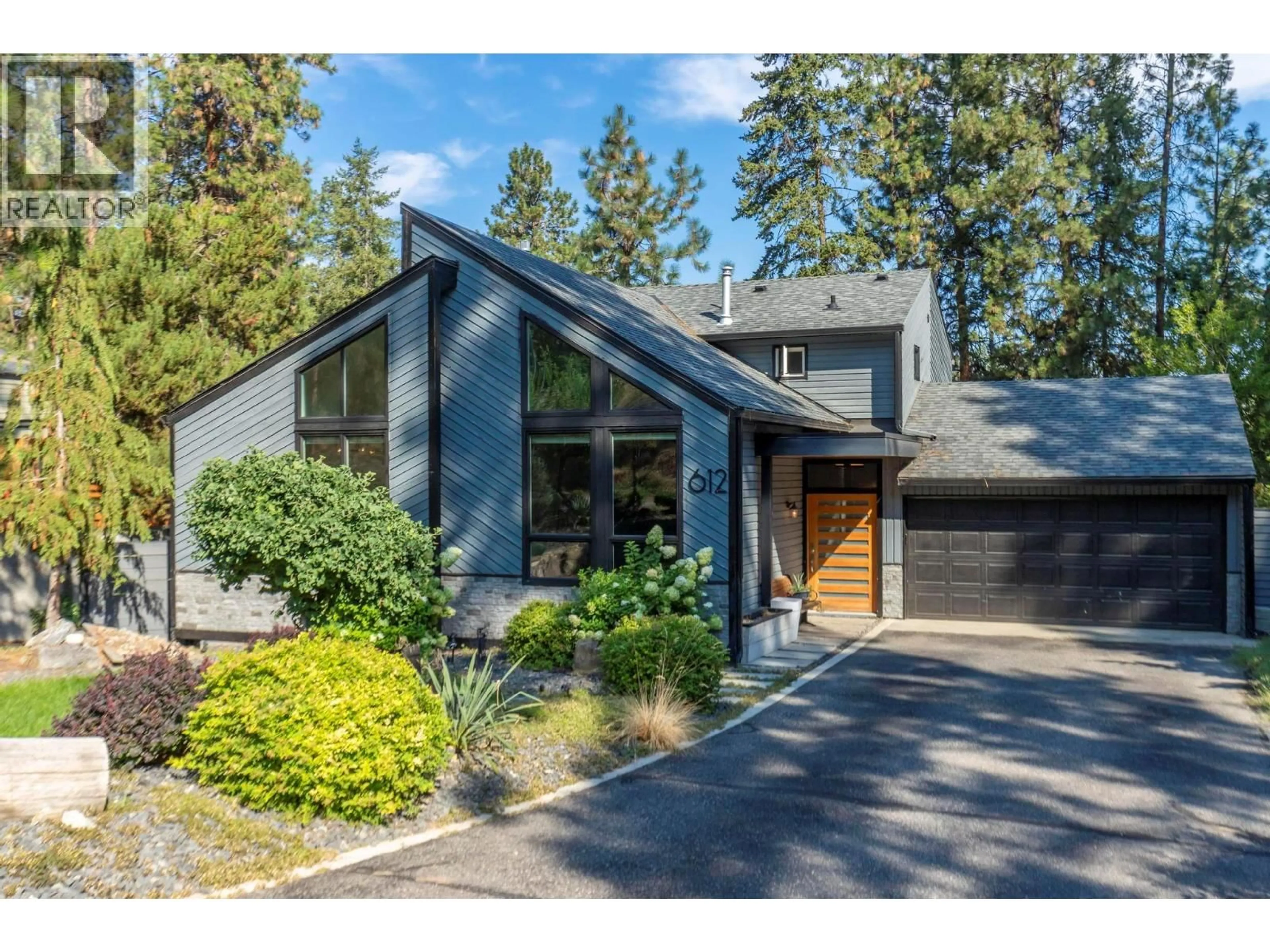 Home with brick exterior material, street for 612 THORNELOE ROAD, Kelowna British Columbia V1W4P6