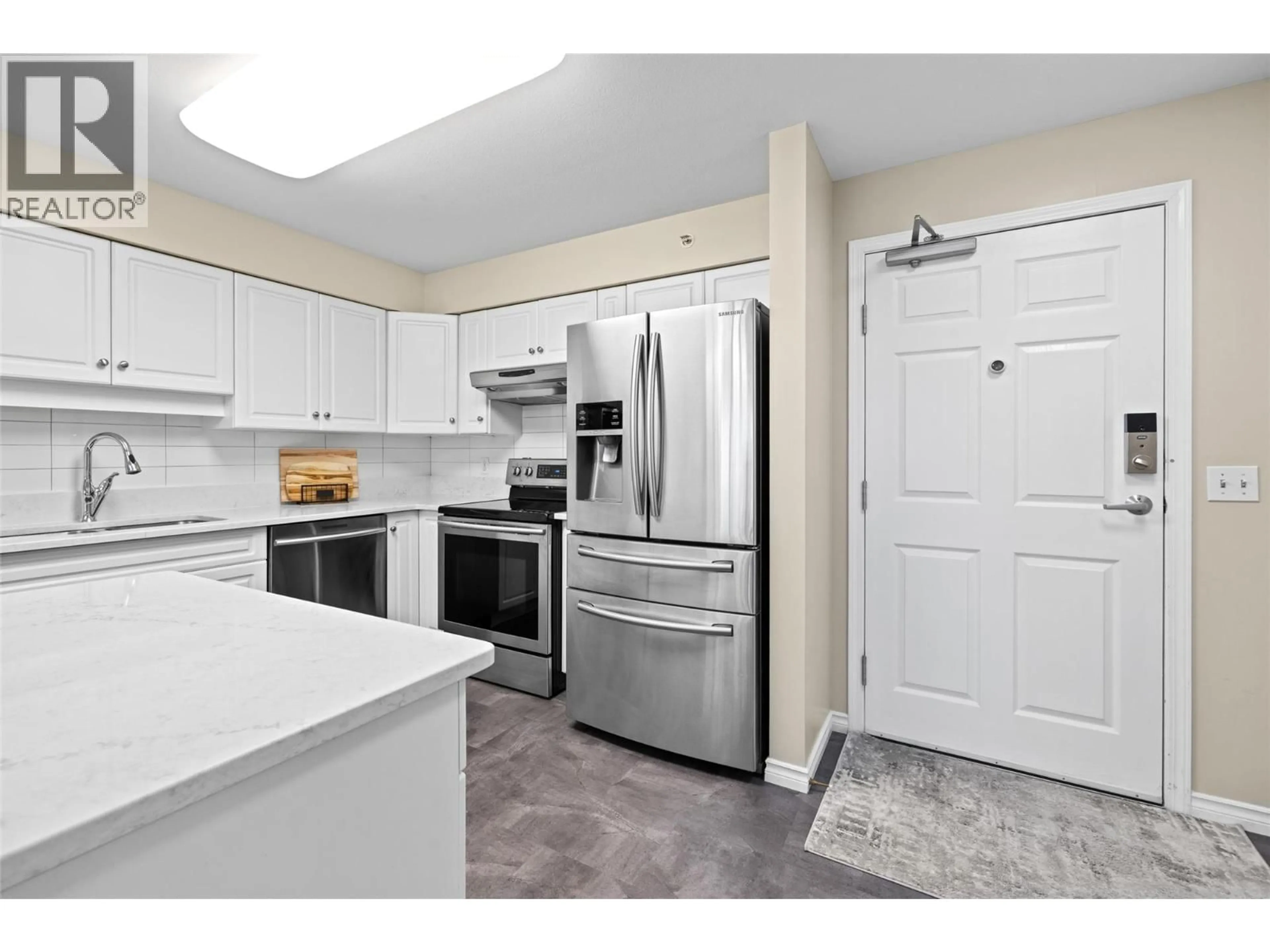 Standard kitchen, ceramic/tile floor for 408 - 265 FROELICH ROAD, Kelowna British Columbia V1X3M6