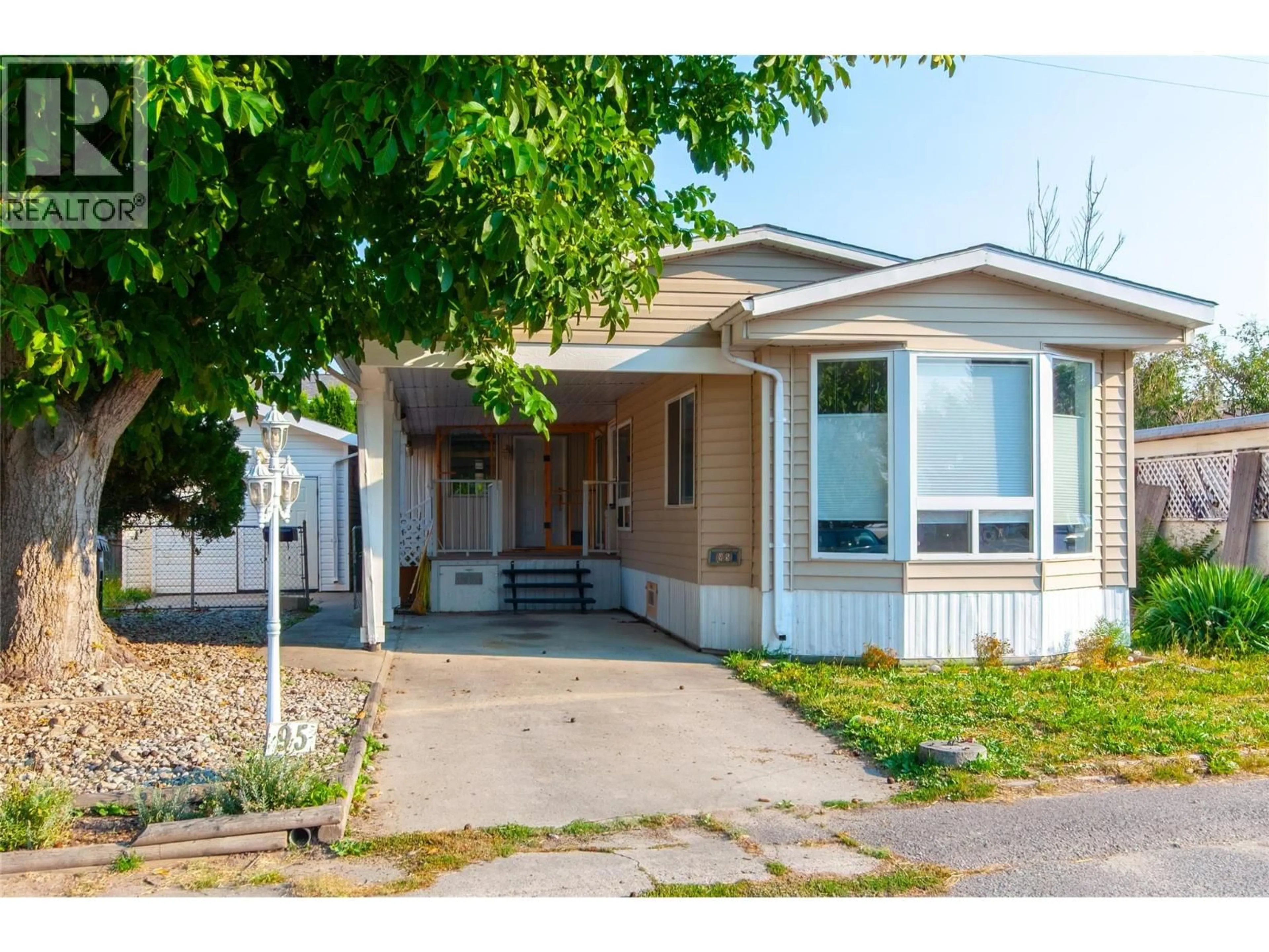 Home with vinyl exterior material, street for 95 - 3245 PARIS STREET, Penticton British Columbia V2A3T9