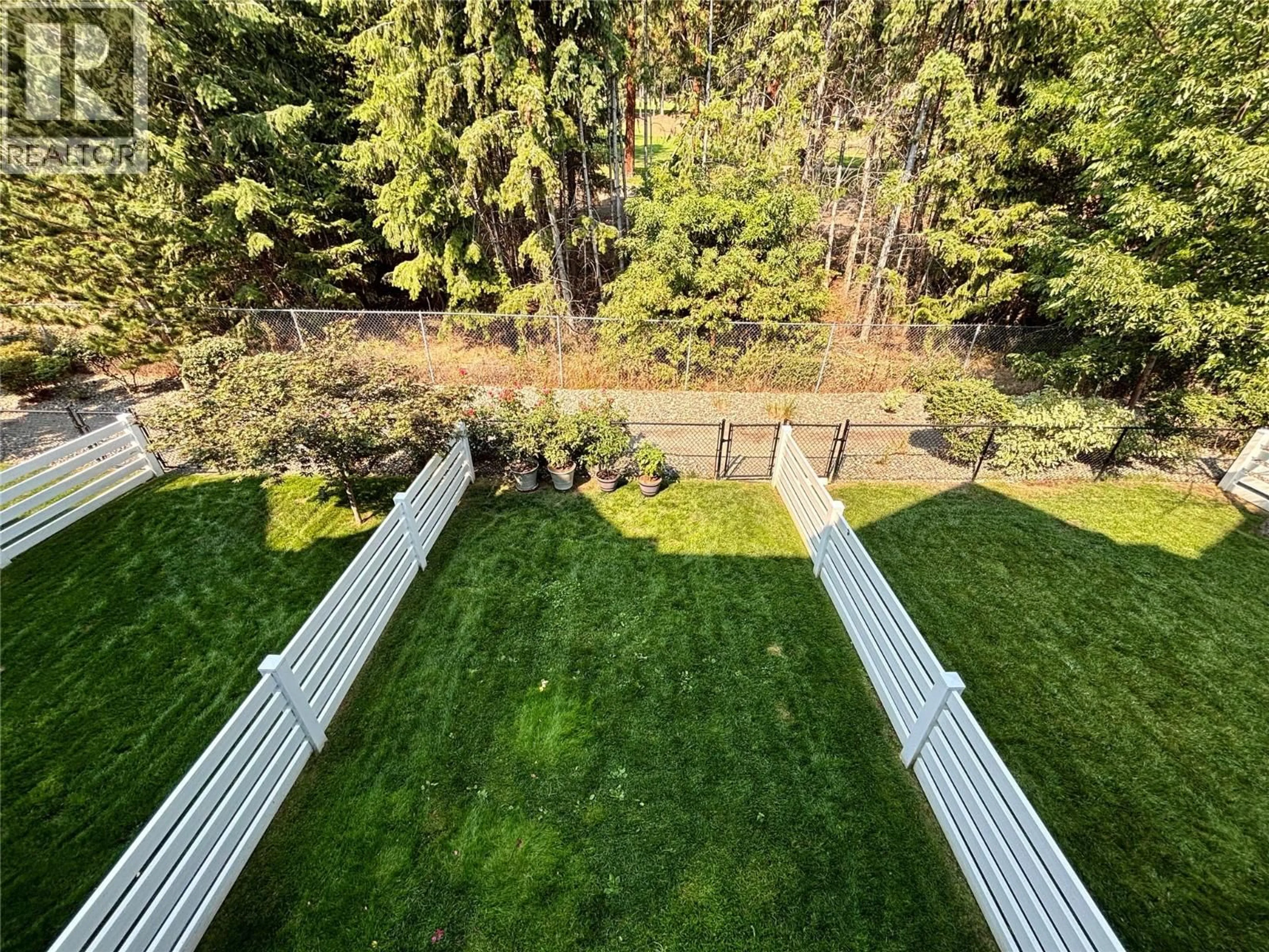 A pic from outside/outdoor area/front of a property/back of a property/a pic from drone, forest/trees view for 43 - 2490 TUSCANY DRIVE, West Kelowna British Columbia V4T3M4