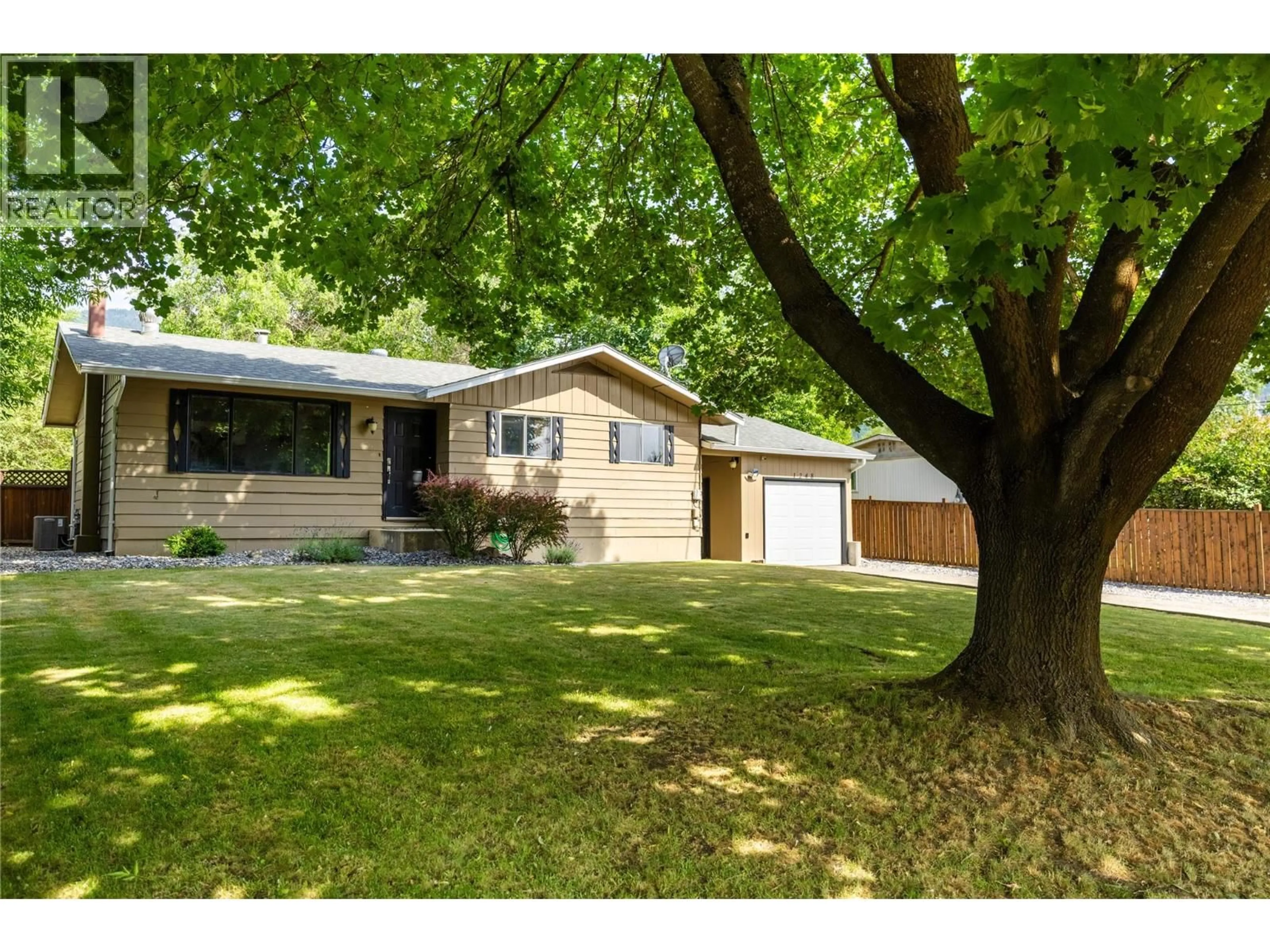Home with vinyl exterior material, street for 1248 SERENE DRIVE, Spallumcheen British Columbia V4Y0N9