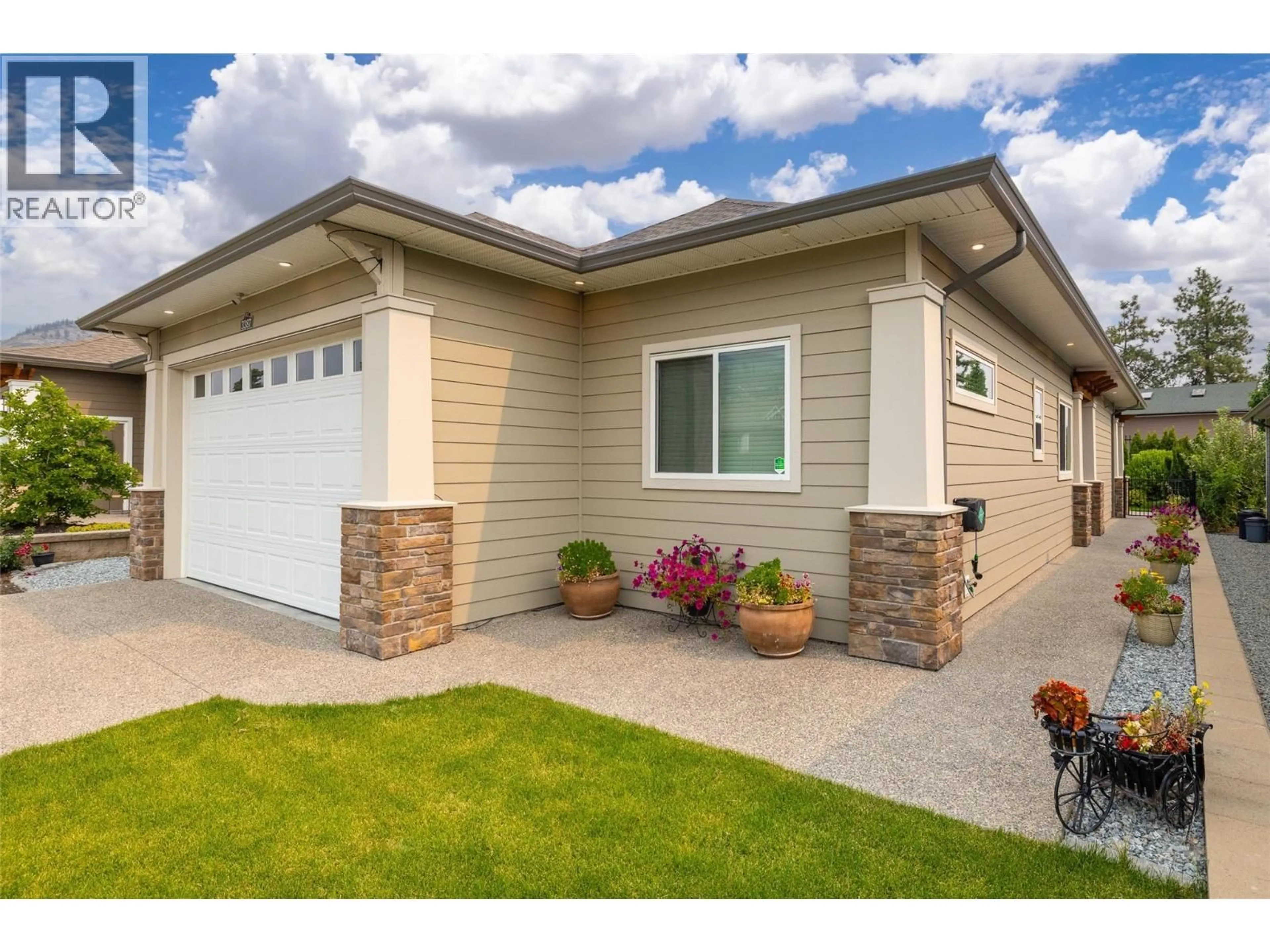 Home with vinyl exterior material, street for 3387 IRONWOOD DRIVE, Westbank British Columbia V4T0A9