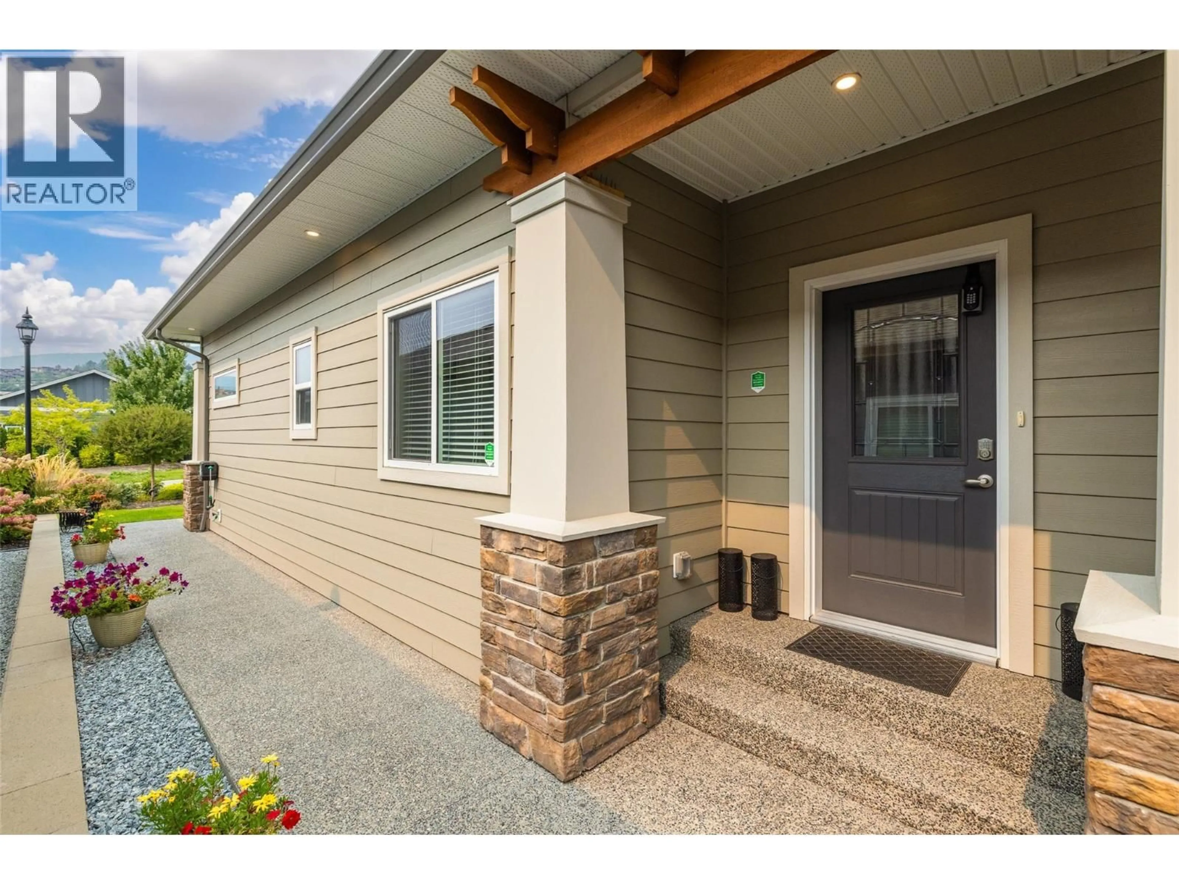 Home with vinyl exterior material, street for 3387 IRONWOOD DRIVE, Westbank British Columbia V4T0A9