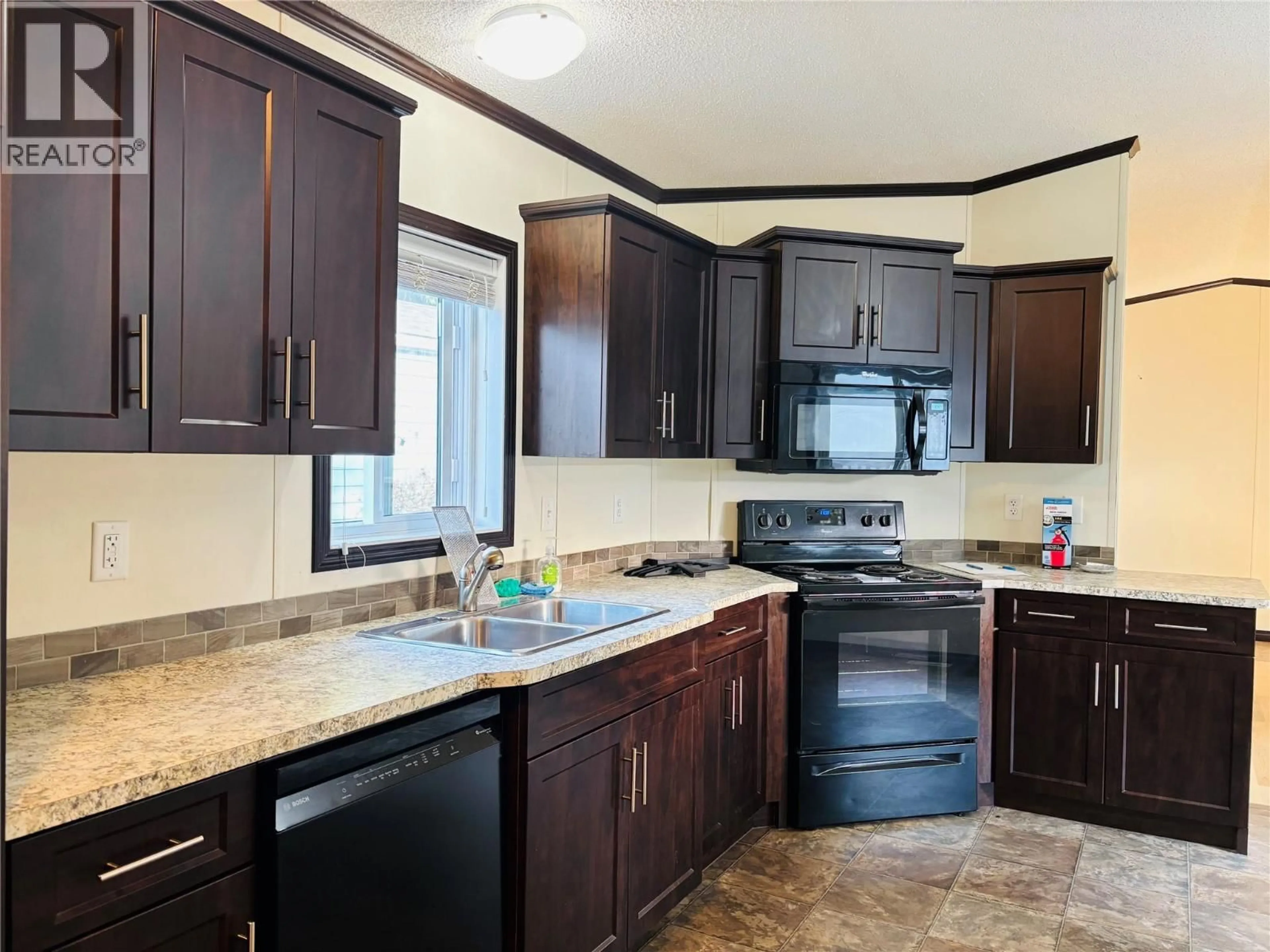 Standard kitchen, ceramic/tile floor for 74 - 1200 OSCAR STREET, Revelstoke British Columbia V0E2S0