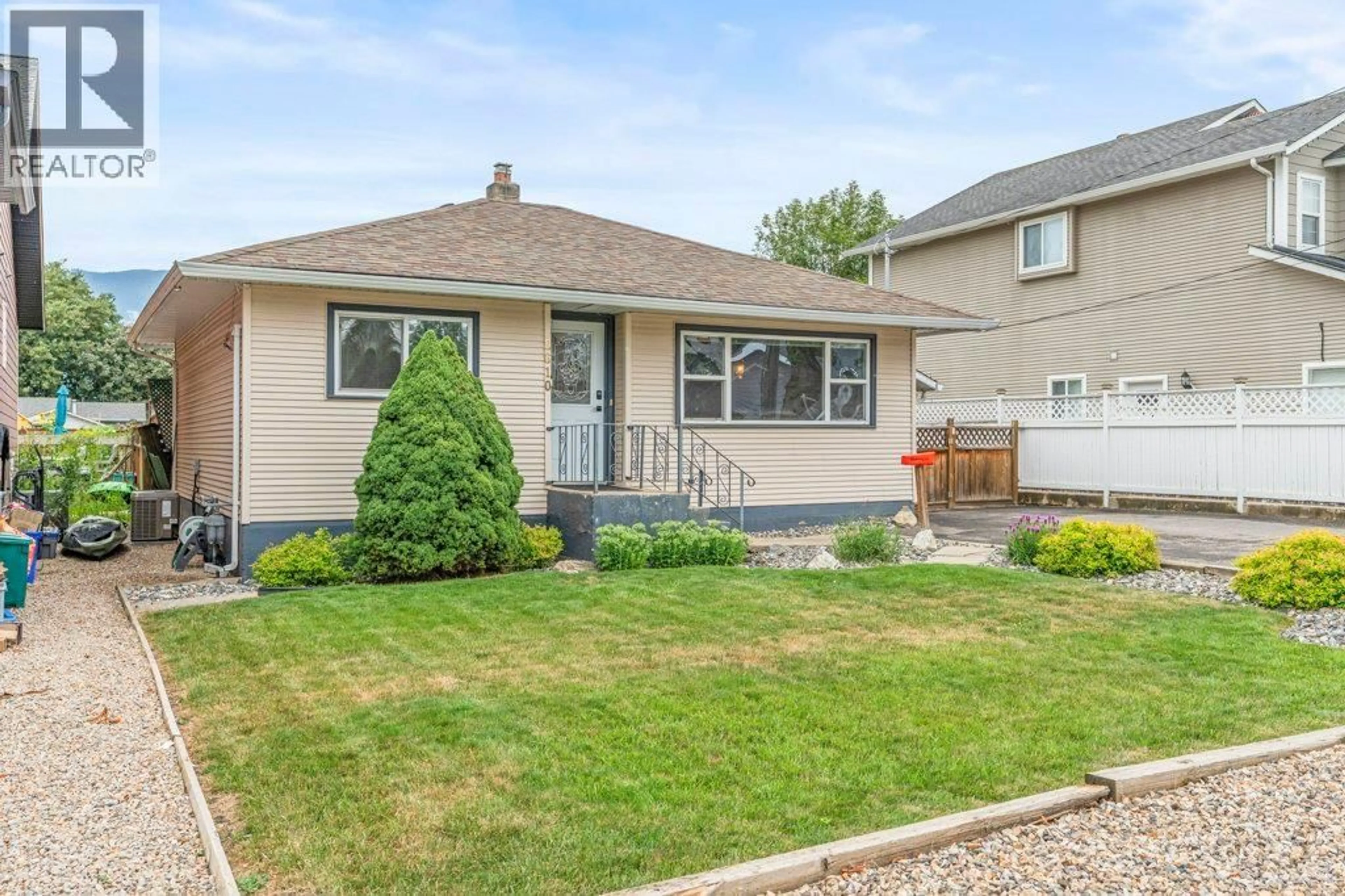 Home with vinyl exterior material, street for 2610 COLONY STREET, Armstrong British Columbia V0E1B2