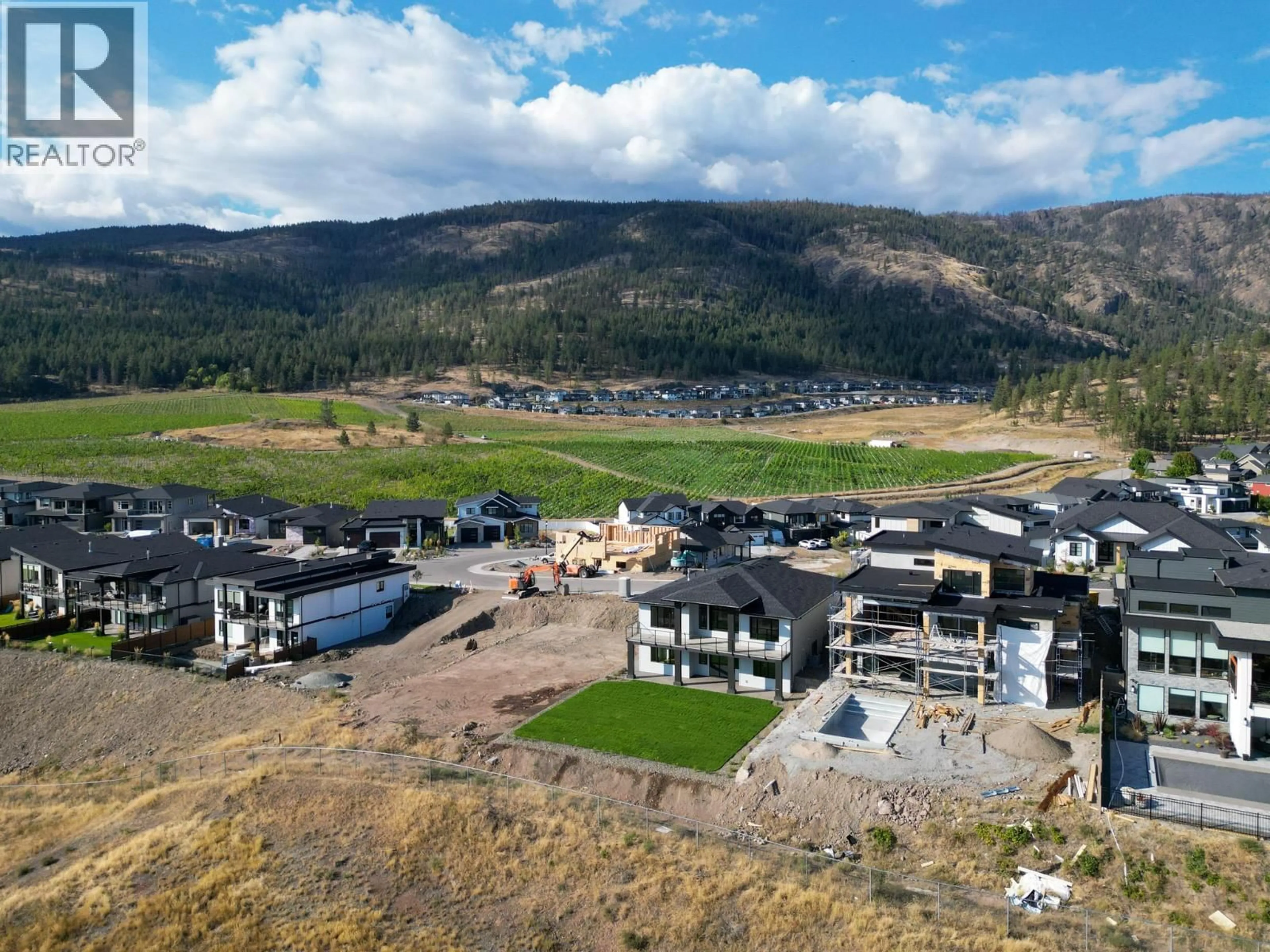 A pic from outside/outdoor area/front of a property/back of a property/a pic from drone, mountain view for 2531 PINNACLE RIDGE DRIVE, West Kelowna British Columbia V4T0G4