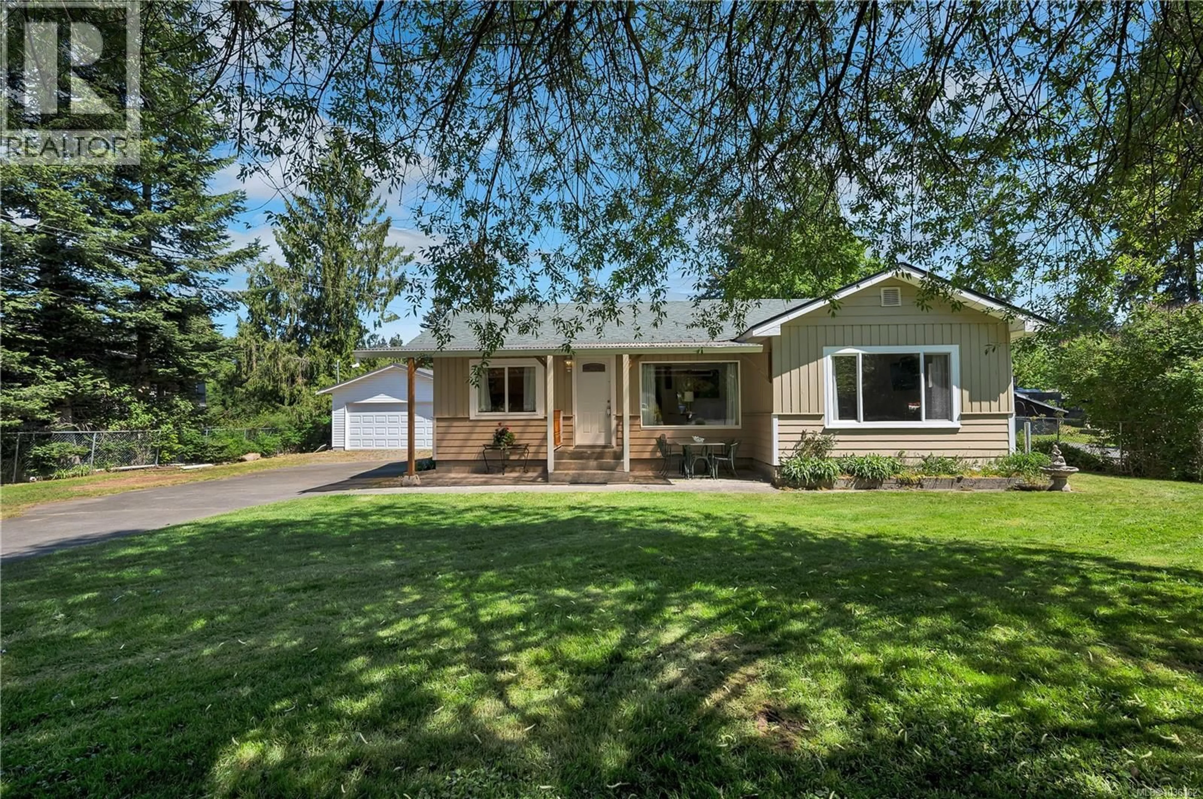 Home with vinyl exterior material, street for 4800 LEWIS ROAD, Campbell River British Columbia V9H1C4