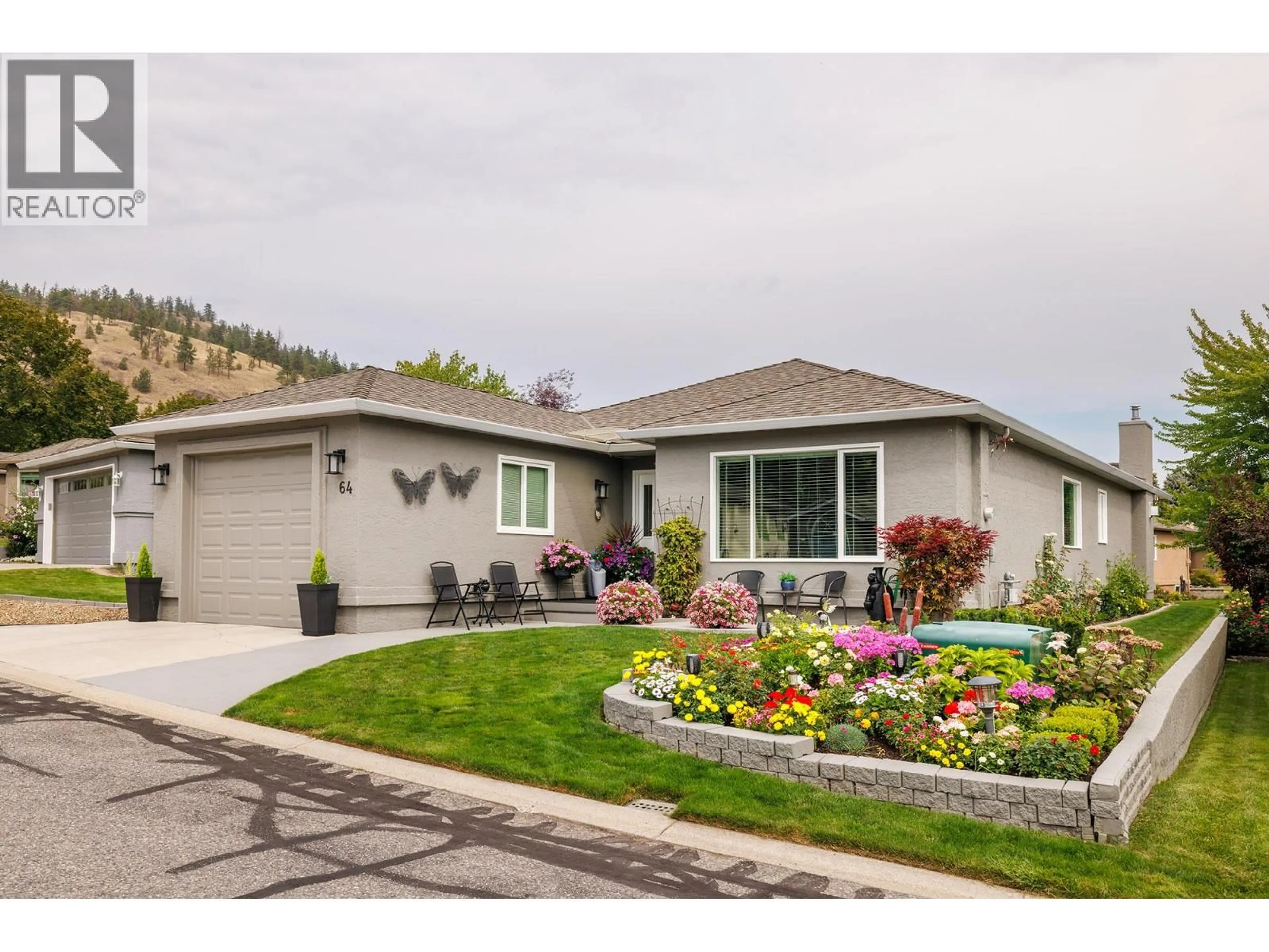 Home with vinyl exterior material, mountain view for 64 - 615 GLENMEADOWS ROAD, Kelowna British Columbia V1V1N9