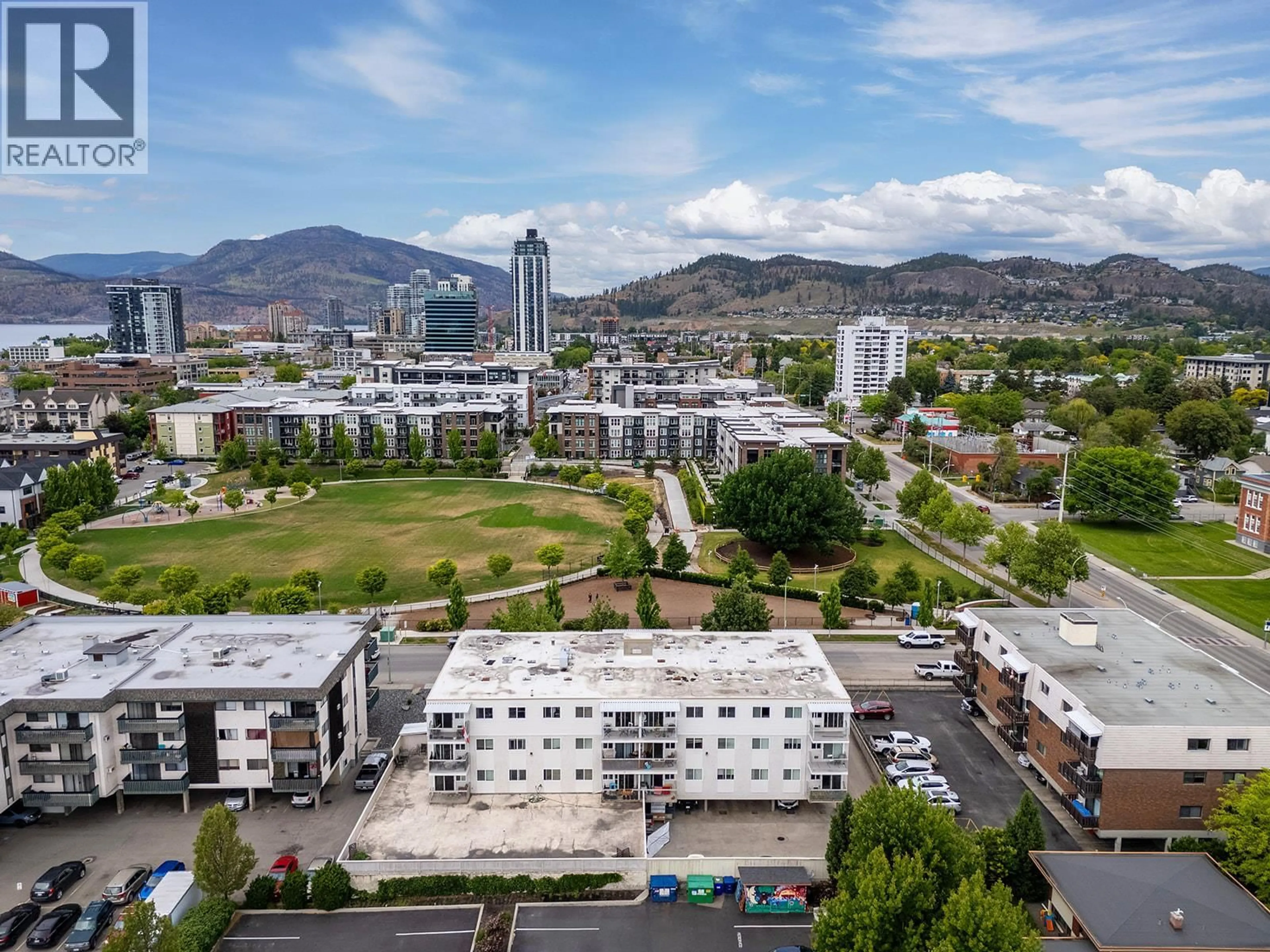 A pic from outside/outdoor area/front of a property/back of a property/a pic from drone, mountain view for 203 - 625 ROWCLIFFE AVENUE, Kelowna British Columbia V1Y5Y8