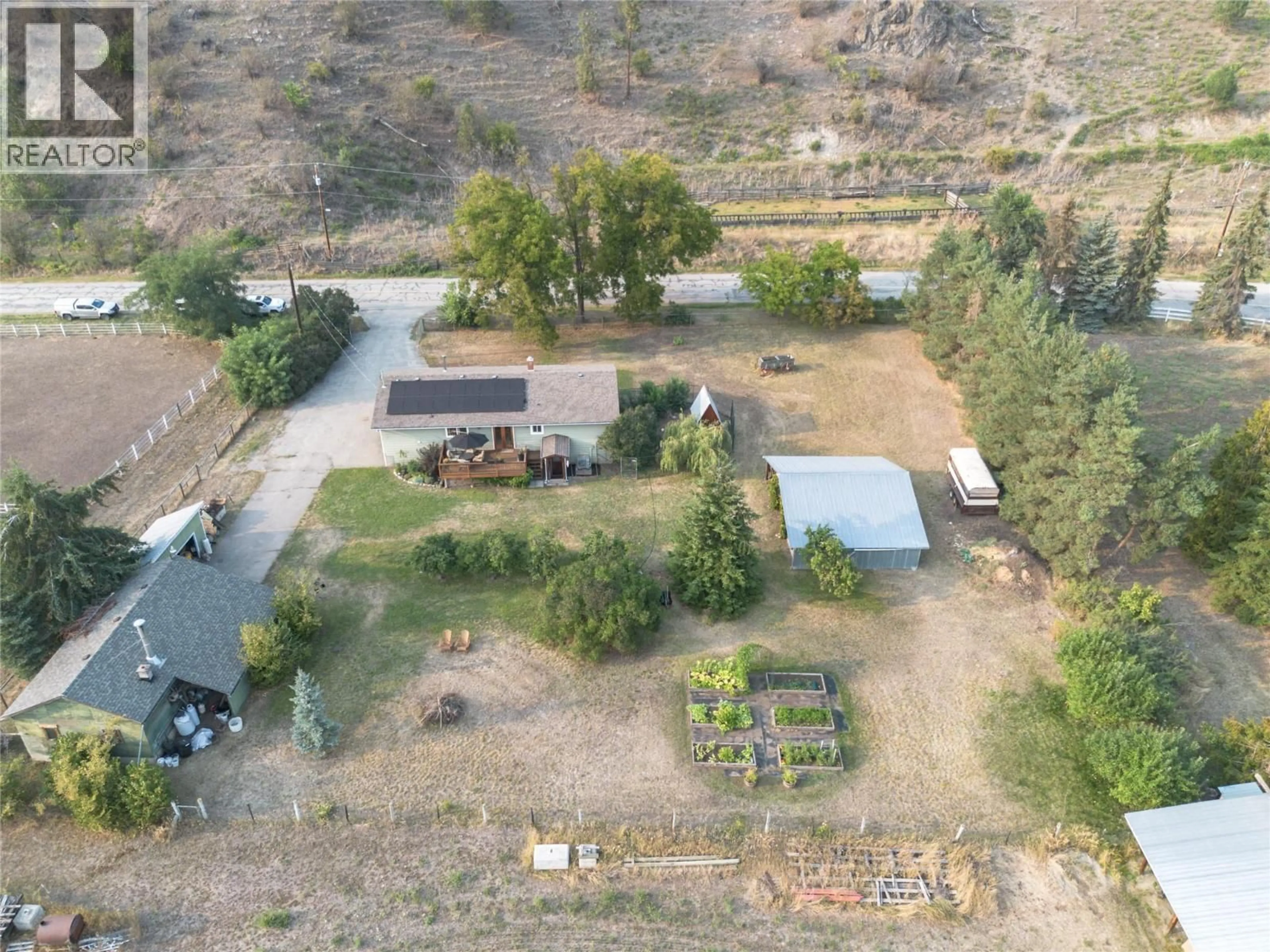A pic from outside/outdoor area/front of a property/back of a property/a pic from drone, unknown for 4715 GRANDVIEW FLATS ROAD, Spallumcheen British Columbia V4Y0P8