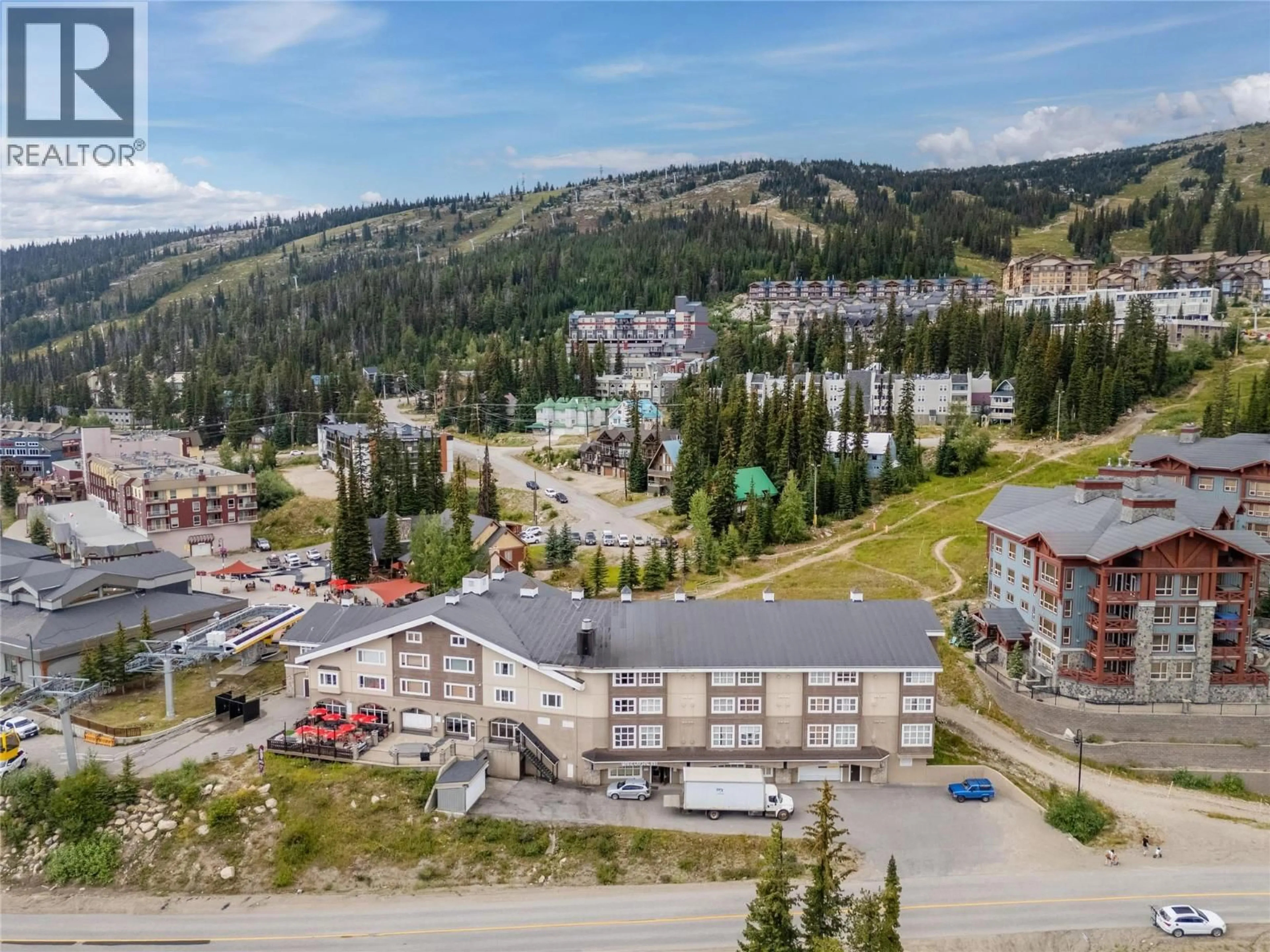 A pic from outside/outdoor area/front of a property/back of a property/a pic from drone, mountain view for 301 - 5275 BIG WHITE ROAD, Big White British Columbia V1P1T4