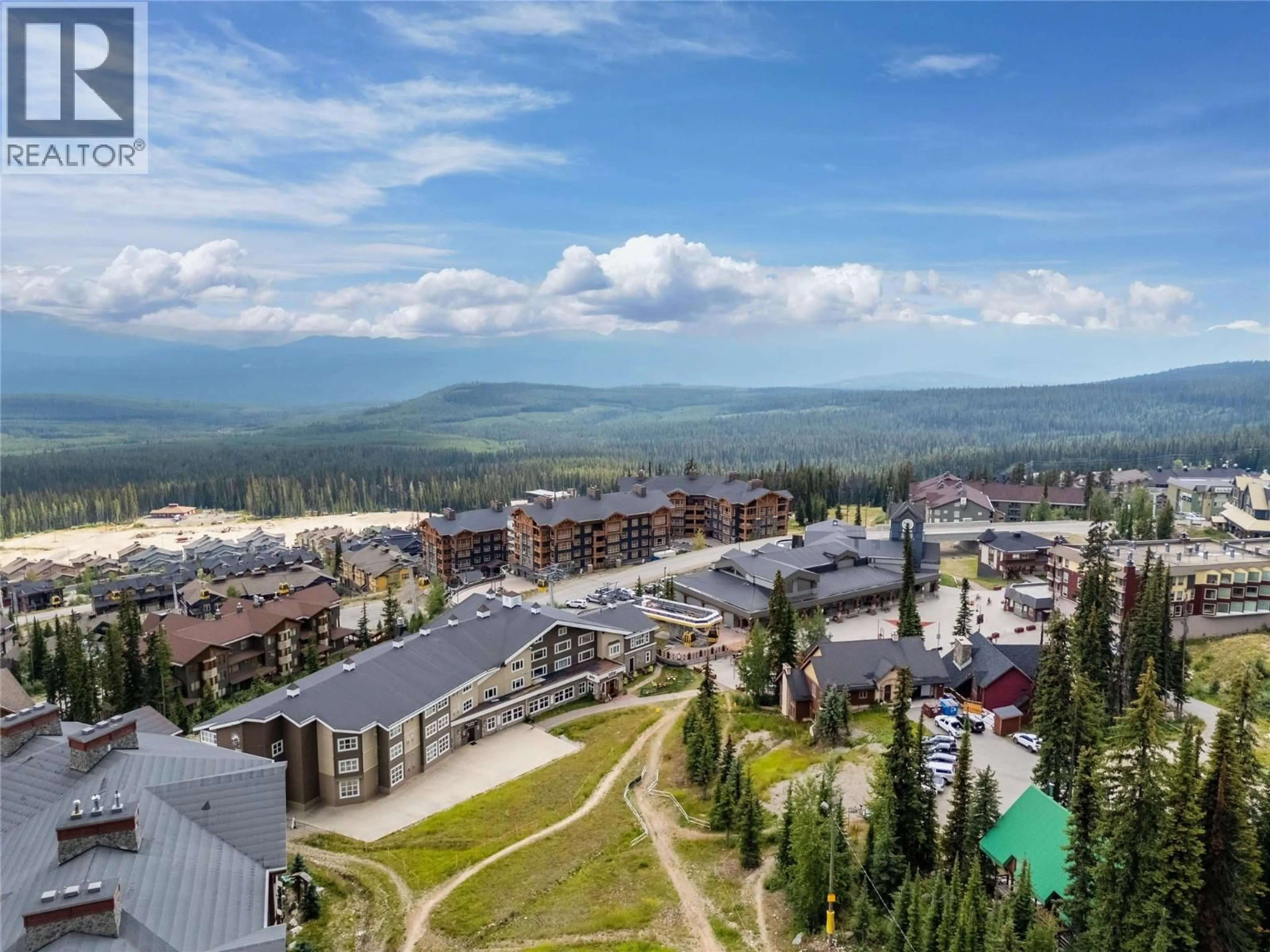 A pic from outside/outdoor area/front of a property/back of a property/a pic from drone, mountain view for 301 - 5275 BIG WHITE ROAD, Big White British Columbia V1P1T4
