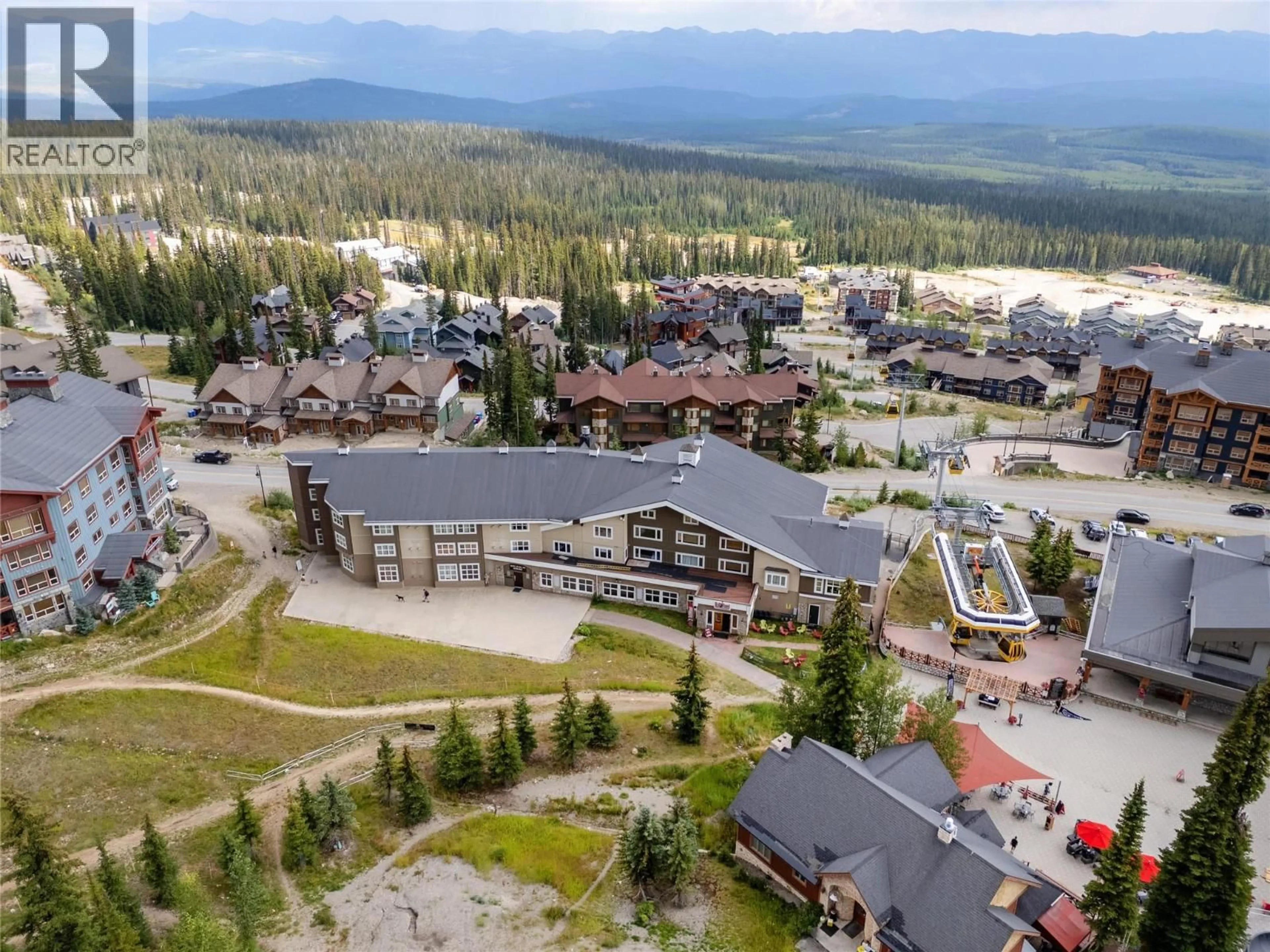 A pic from outside/outdoor area/front of a property/back of a property/a pic from drone, mountain view for 301 - 5275 BIG WHITE ROAD, Big White British Columbia V1P1T4
