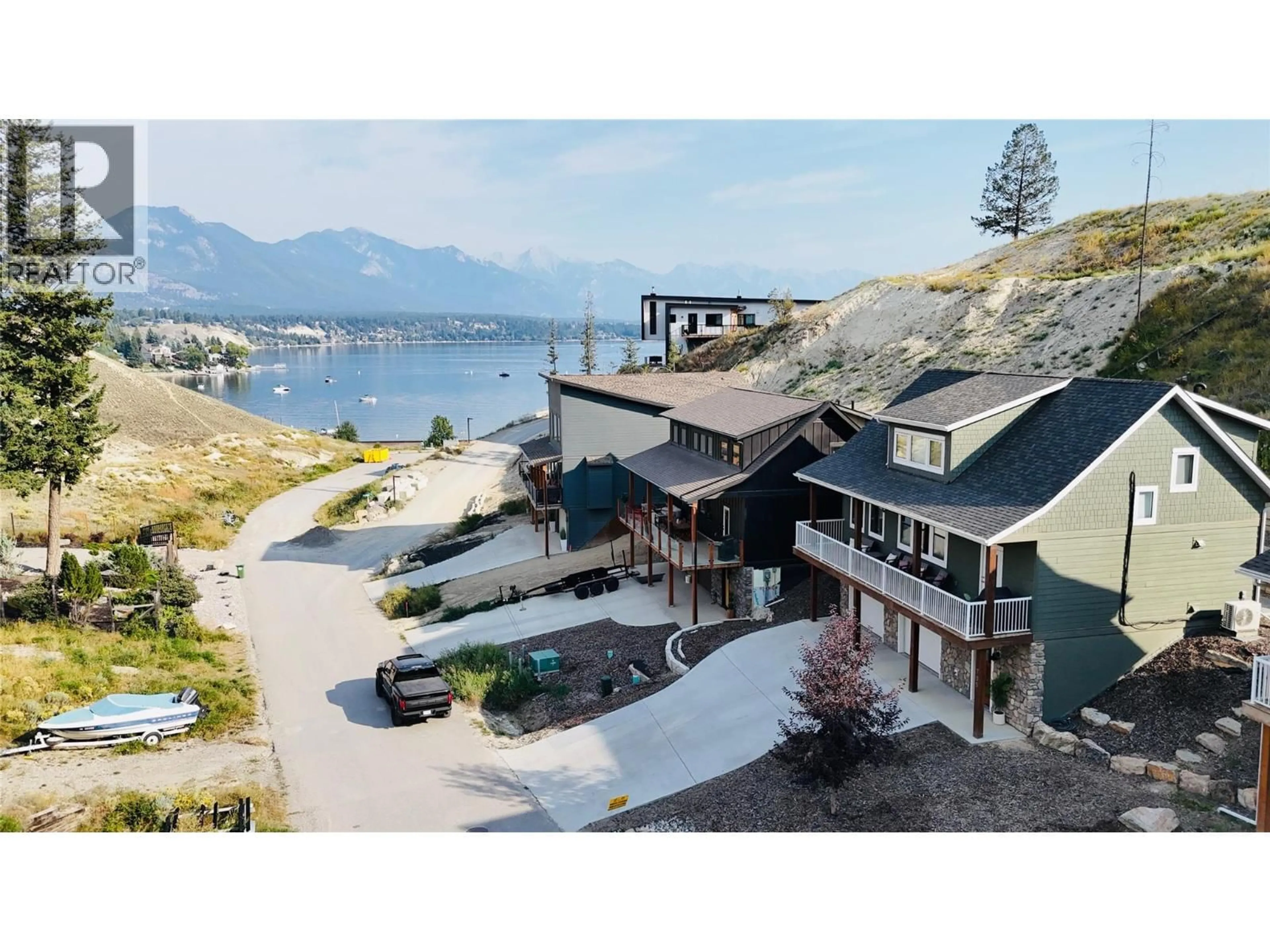 A pic from outside/outdoor area/front of a property/back of a property/a pic from drone, water/lake/river/ocean view for 705 KPOKL ROAD, Invermere British Columbia V0A1K0