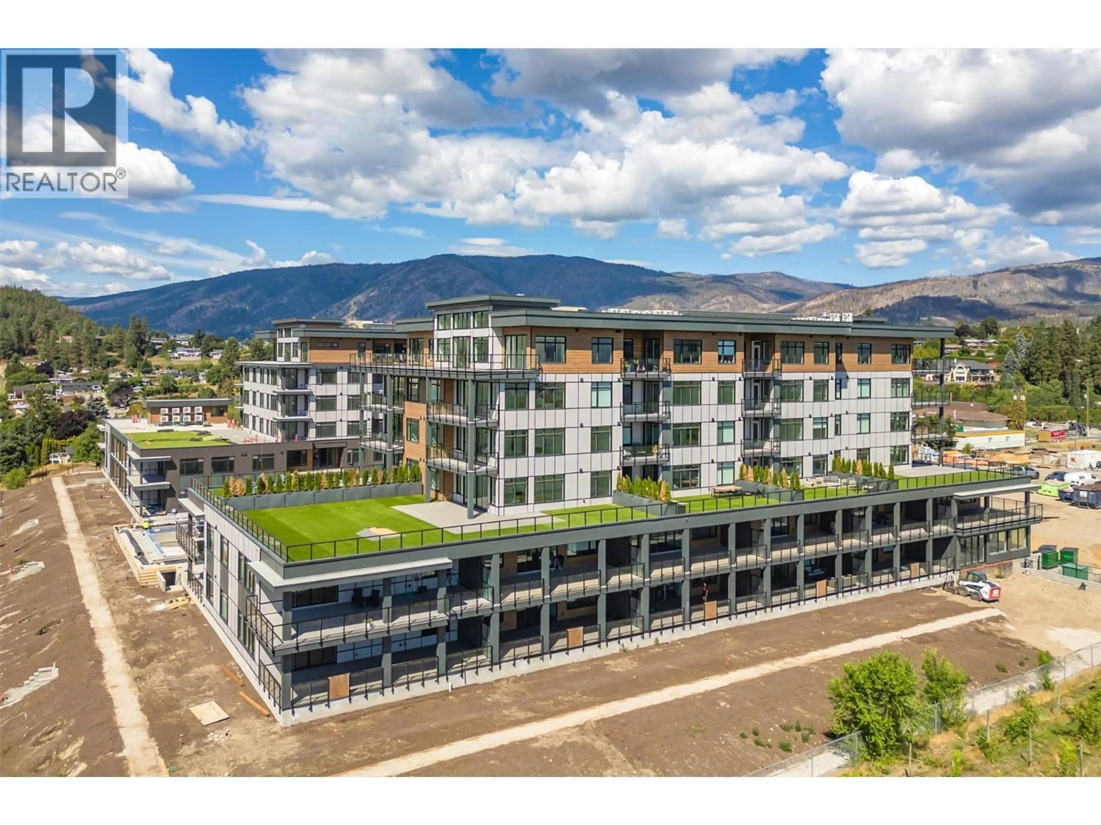 A pic from outside/outdoor area/front of a property/back of a property/a pic from drone, mountain view for 307 - 2780 OLALLA ROAD, West Kelowna British Columbia V1Z2A9