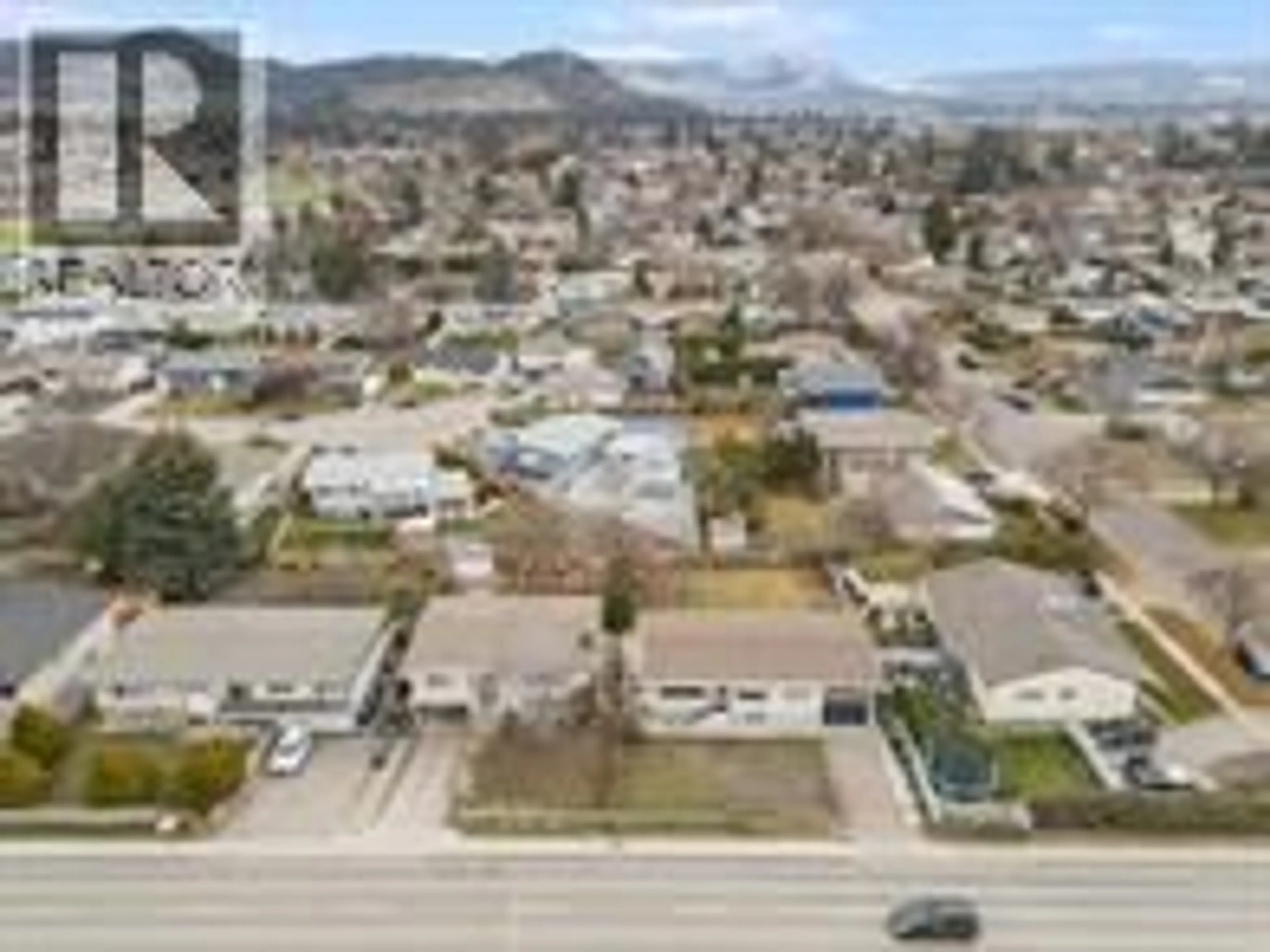 A pic from outside/outdoor area/front of a property/back of a property/a pic from drone, street for 1387 GORDON DRIVE, Kelowna British Columbia V1Y3E9