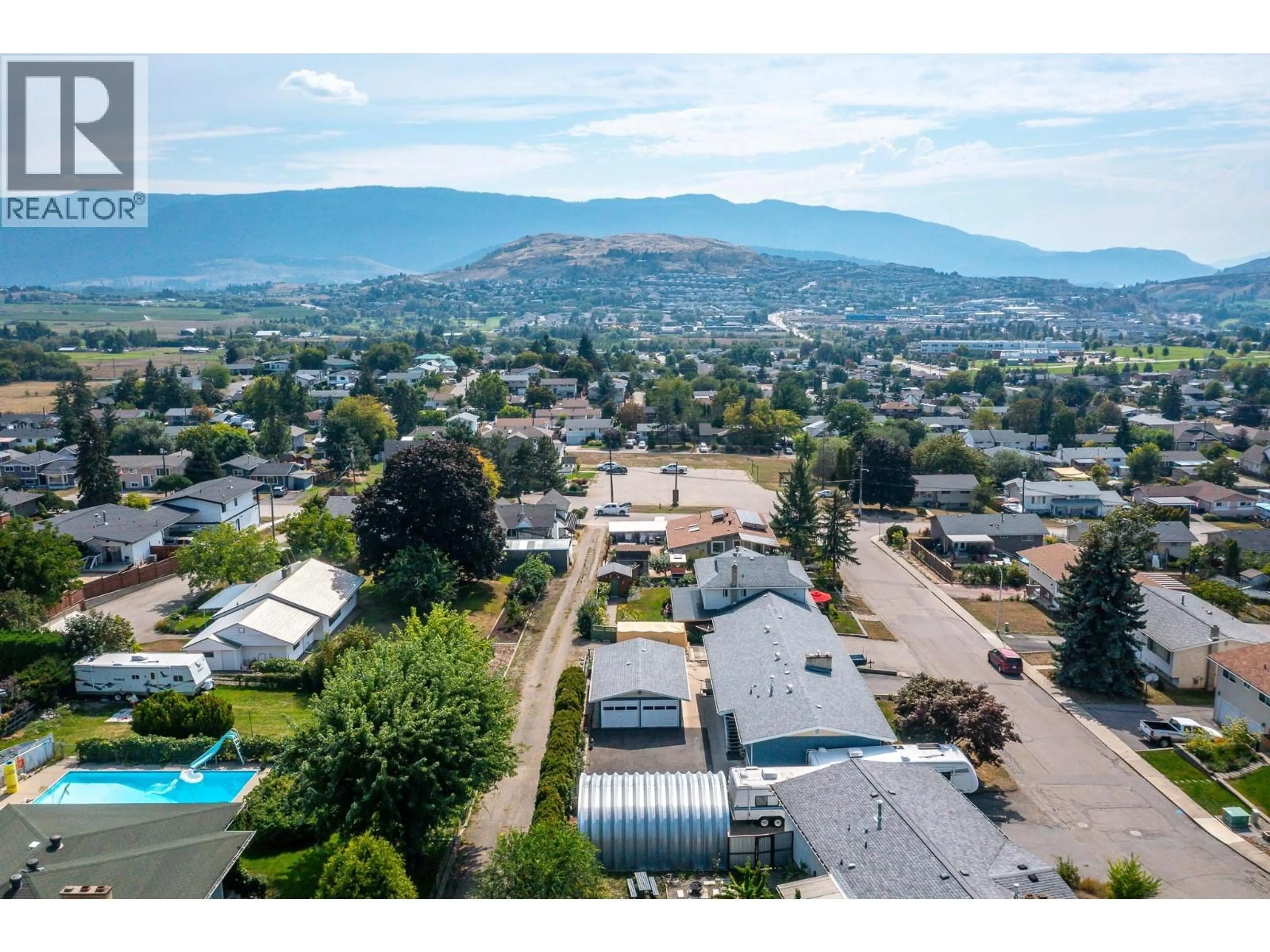 A pic from outside/outdoor area/front of a property/back of a property/a pic from drone, mountain view for 3007 13 STREET, Vernon British Columbia V1T6T6
