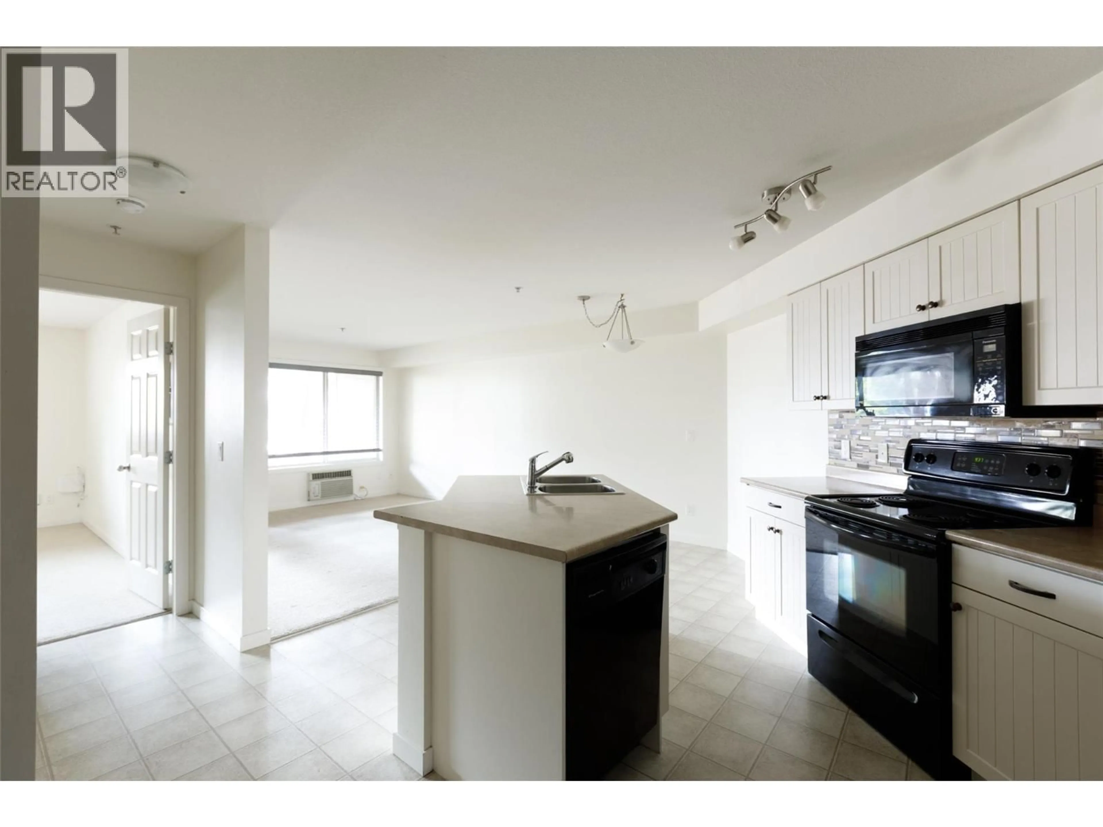 Open concept kitchen, unknown for 111 - 135 ZIPRICK ROAD, Kelowna British Columbia V1X8B2