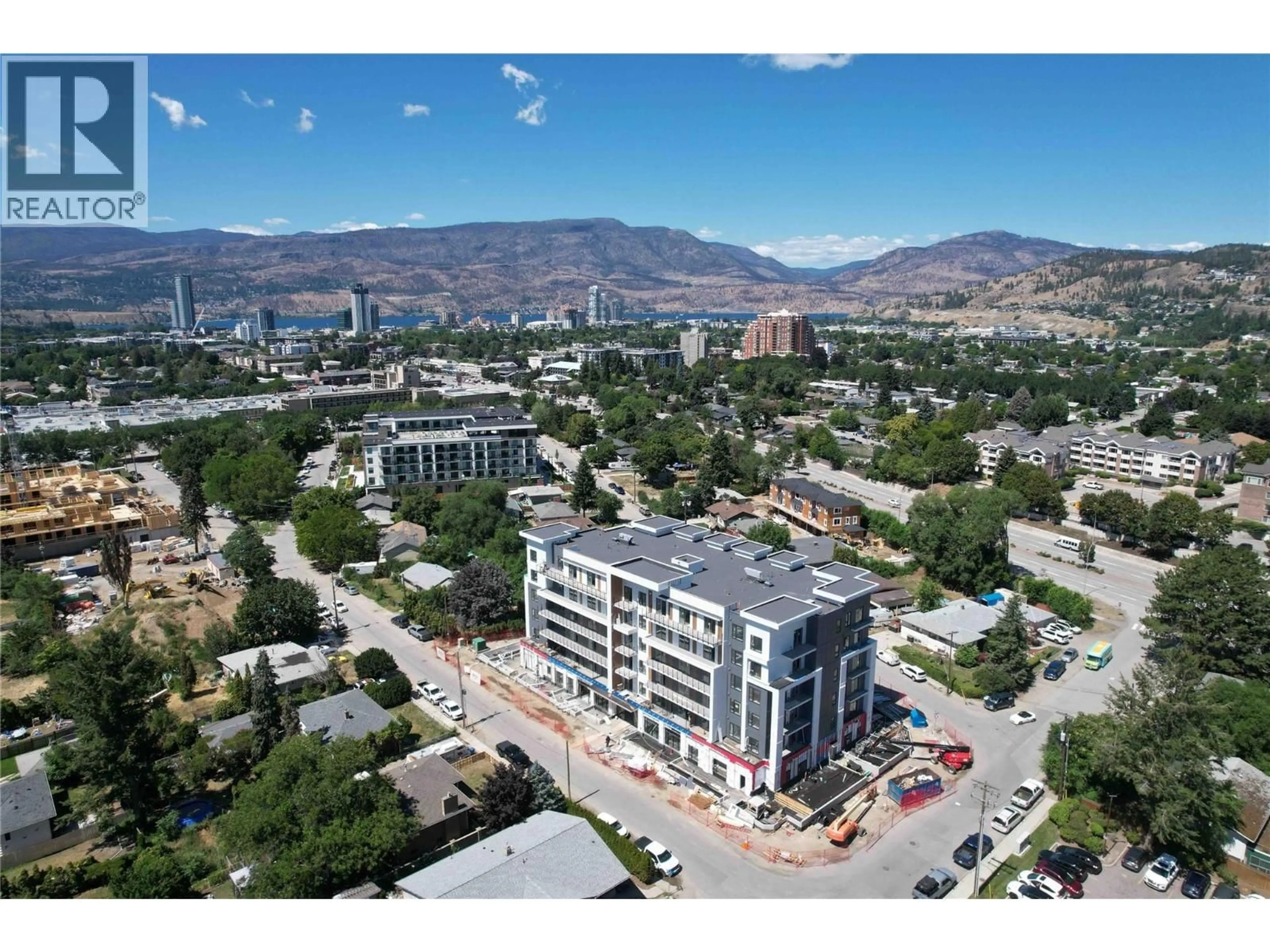 A pic from outside/outdoor area/front of a property/back of a property/a pic from drone, mountain view for 201 - 1380 PRIDHAM AVENUE, Kelowna British Columbia V1Y6B5
