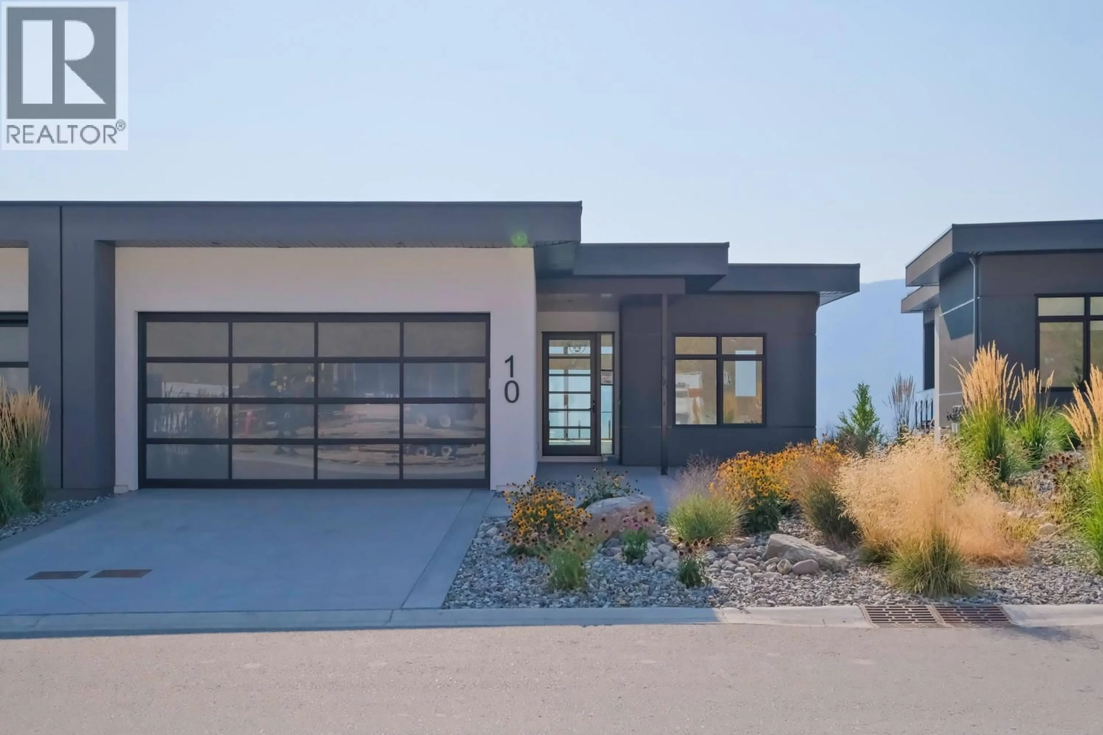 Home with brick exterior material, street for 10 - 9201 OKANAGAN CENTRE ROAD WEST, Lake Country British Columbia V4V0B8
