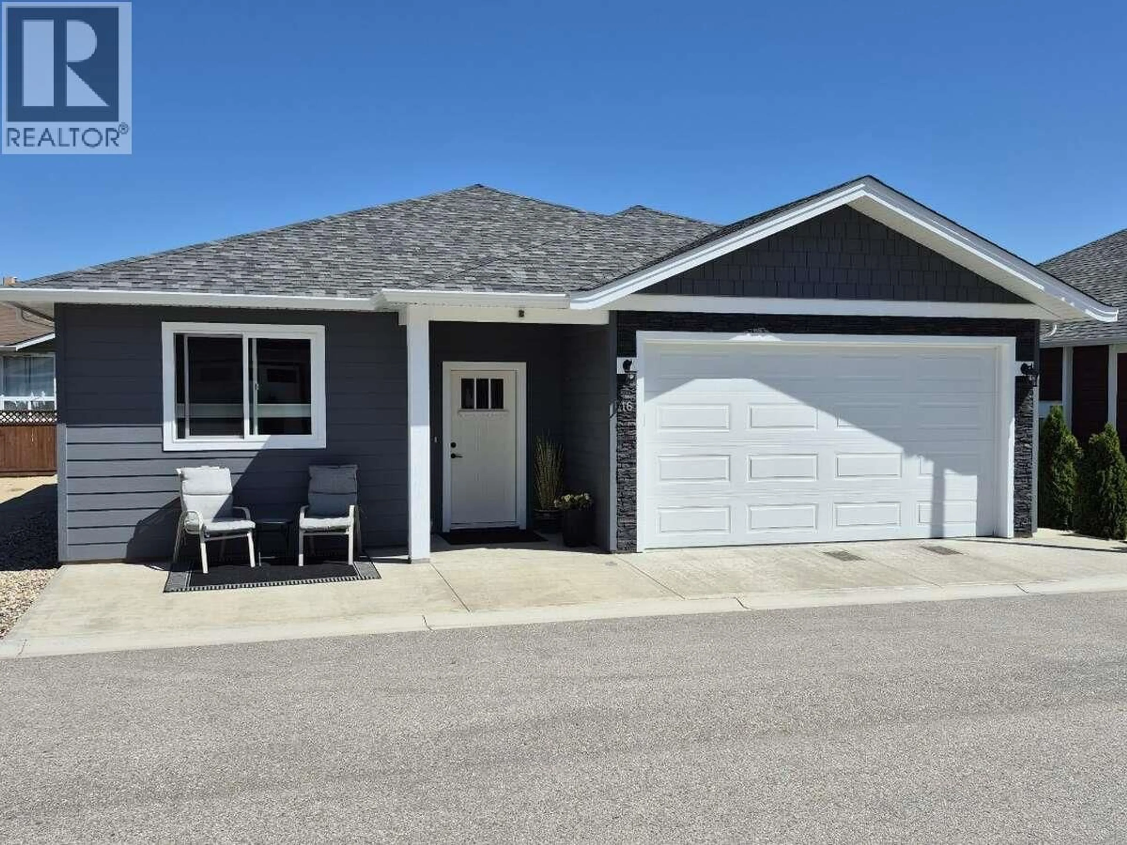 Home with vinyl exterior material, street for 16 - 1330 10TH STREET SOUTHWEST, Salmon Arm British Columbia V1E0E4