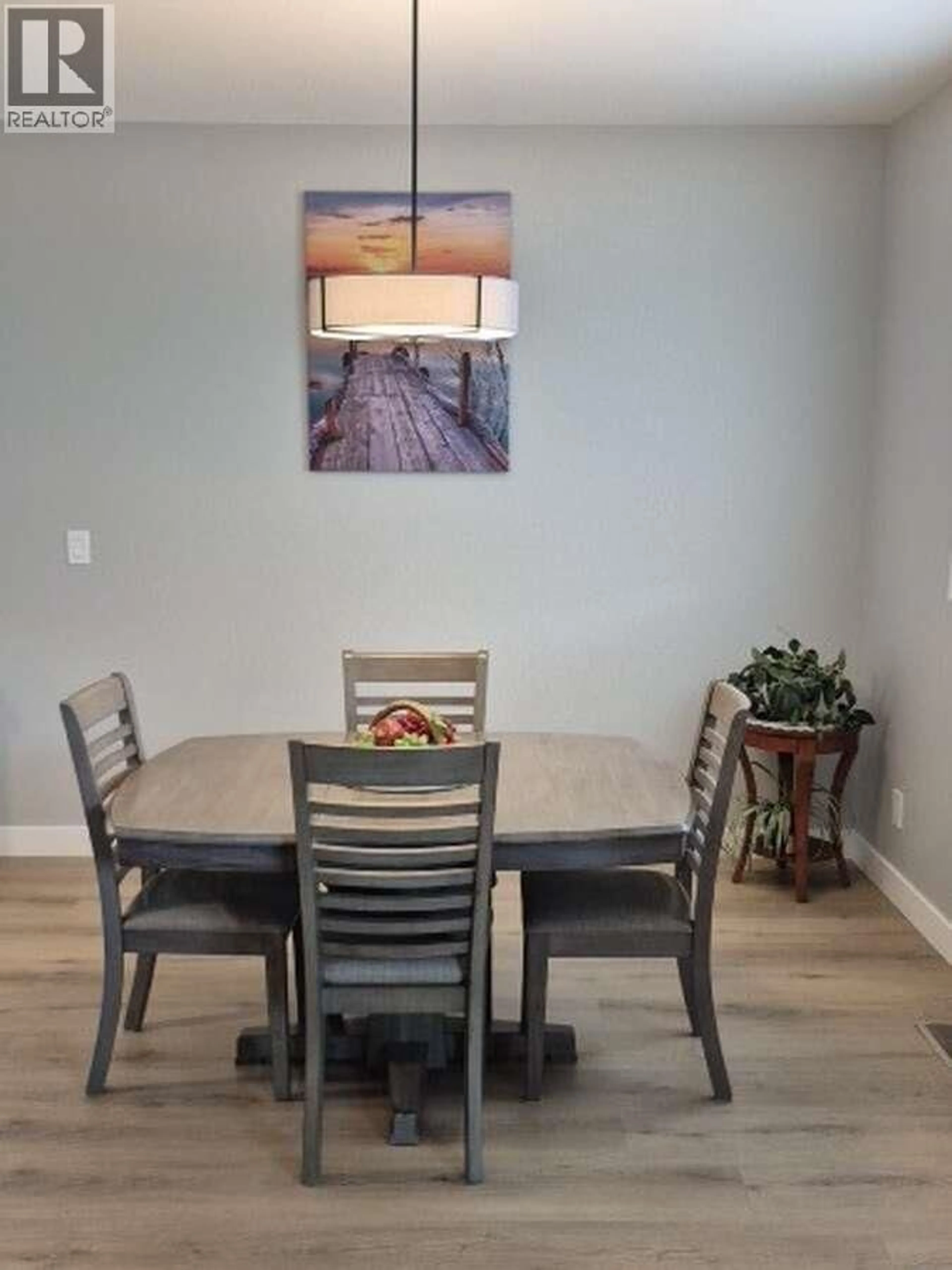Dining room, wood/laminate floor for 16 - 1330 10TH STREET SOUTHWEST, Salmon Arm British Columbia V1E0E4