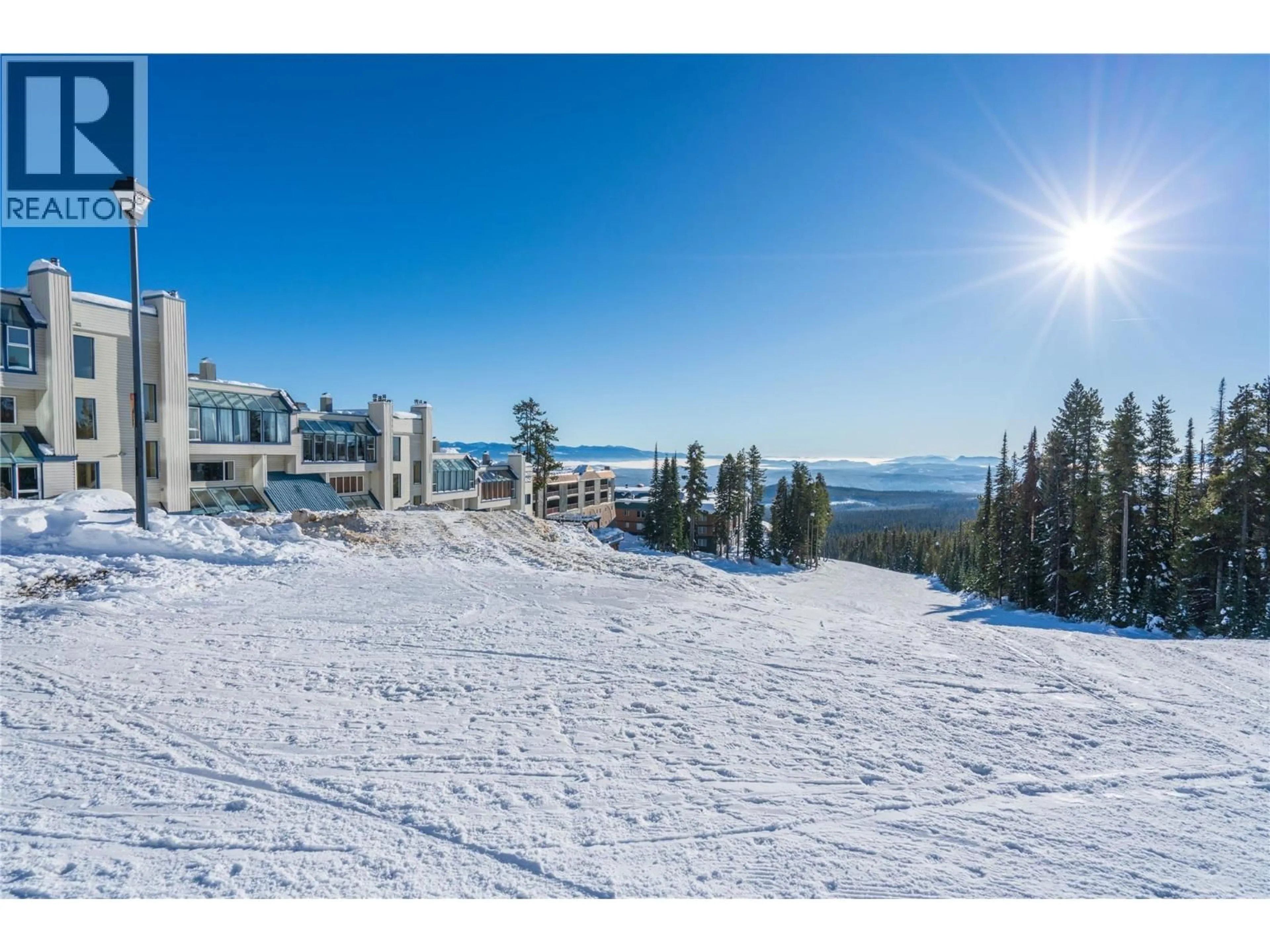 A pic from outside/outdoor area/front of a property/back of a property/a pic from drone, mountain view for B6 - 7375 PORCUPINE ROAD, Big White British Columbia V1P1P3