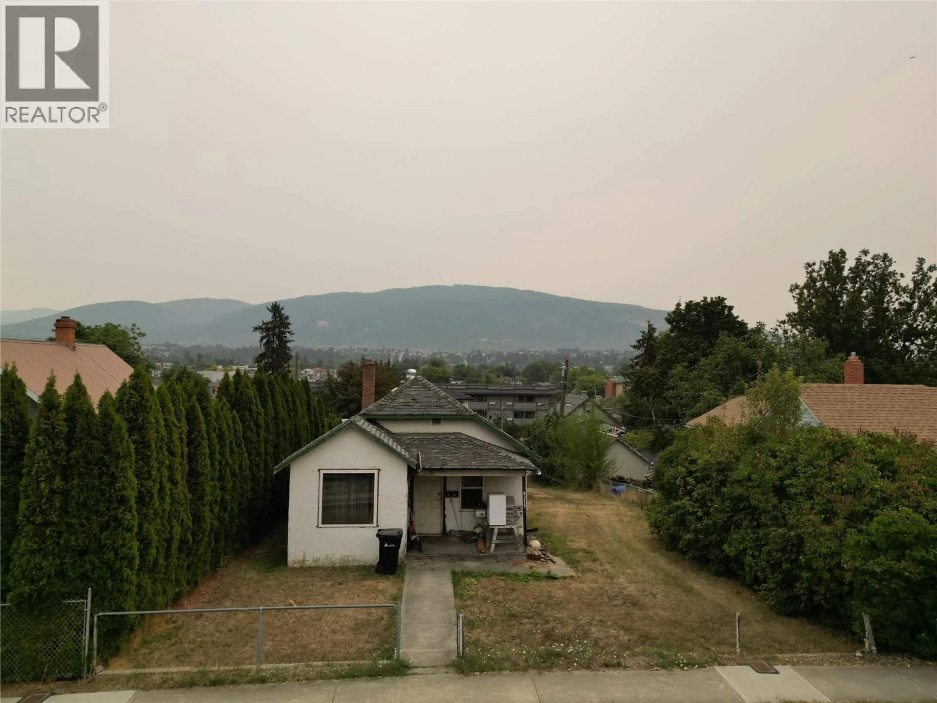 A pic from outside/outdoor area/front of a property/back of a property/a pic from drone, mountain view for 4215 34 STREET, Vernon British Columbia V1T5Y5