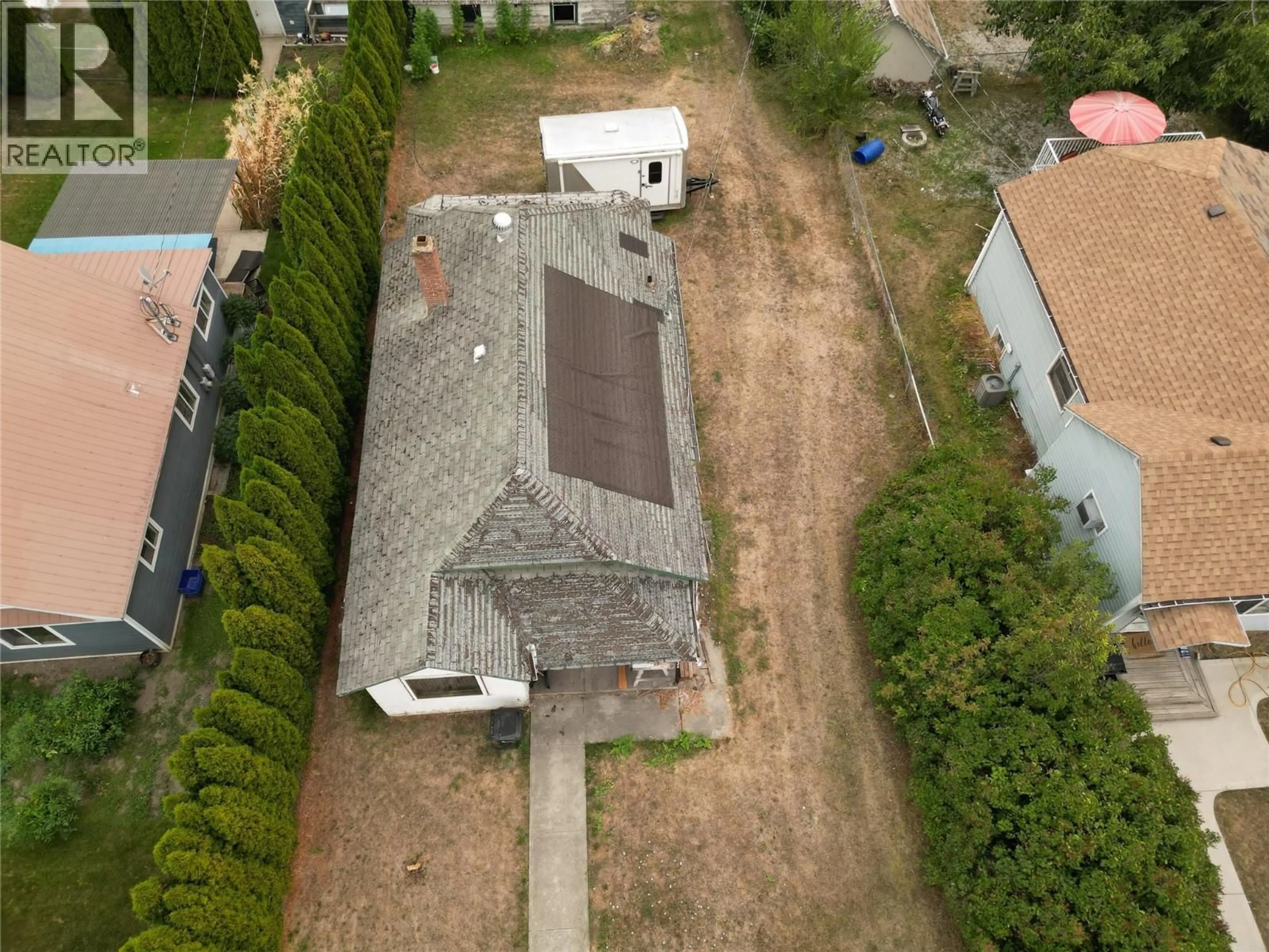 A pic from outside/outdoor area/front of a property/back of a property/a pic from drone, building for 4215 34 STREET, Vernon British Columbia V1T5Y5