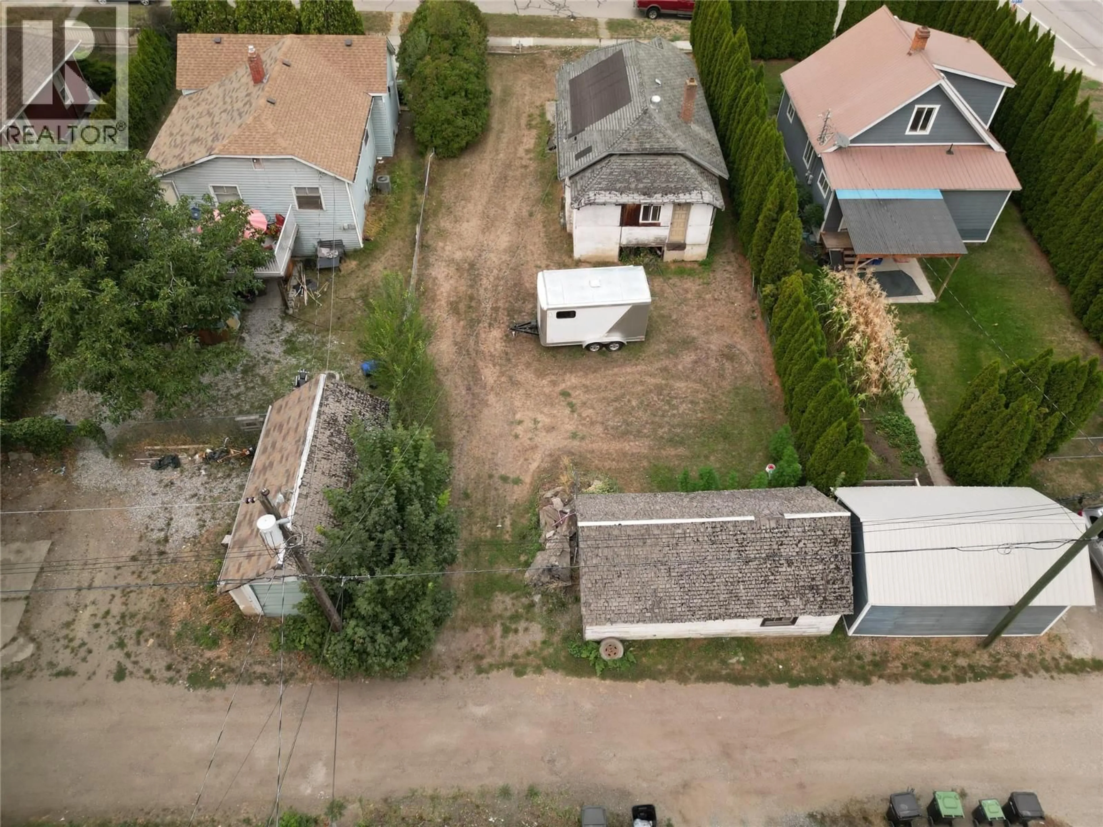 A pic from outside/outdoor area/front of a property/back of a property/a pic from drone, street for 4215 34 STREET, Vernon British Columbia V1T5Y5