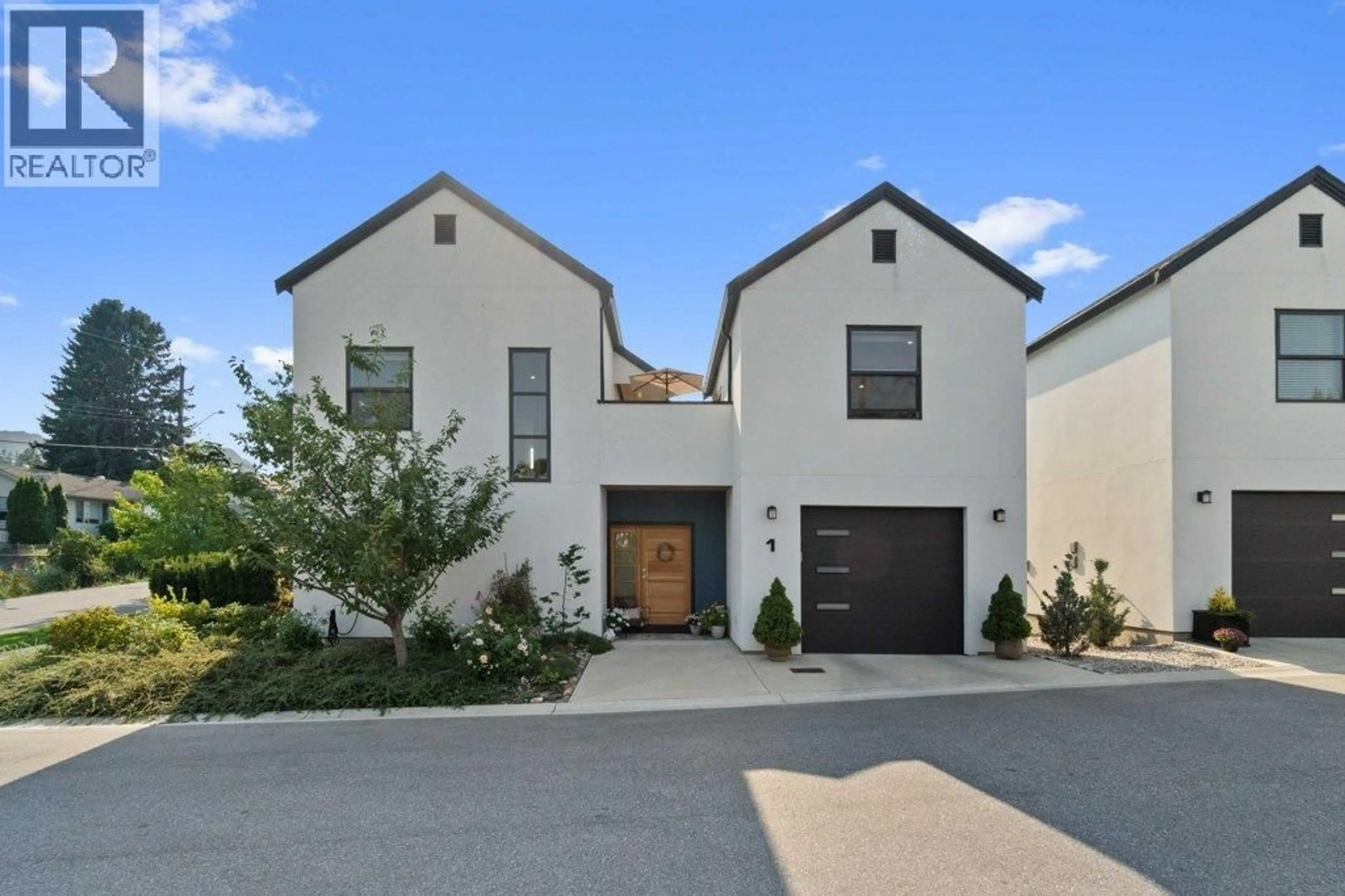 Home with brick exterior material, street for 1 - 1151 8 AVENUE NORTHEAST, Salmon Arm British Columbia V1E4A5