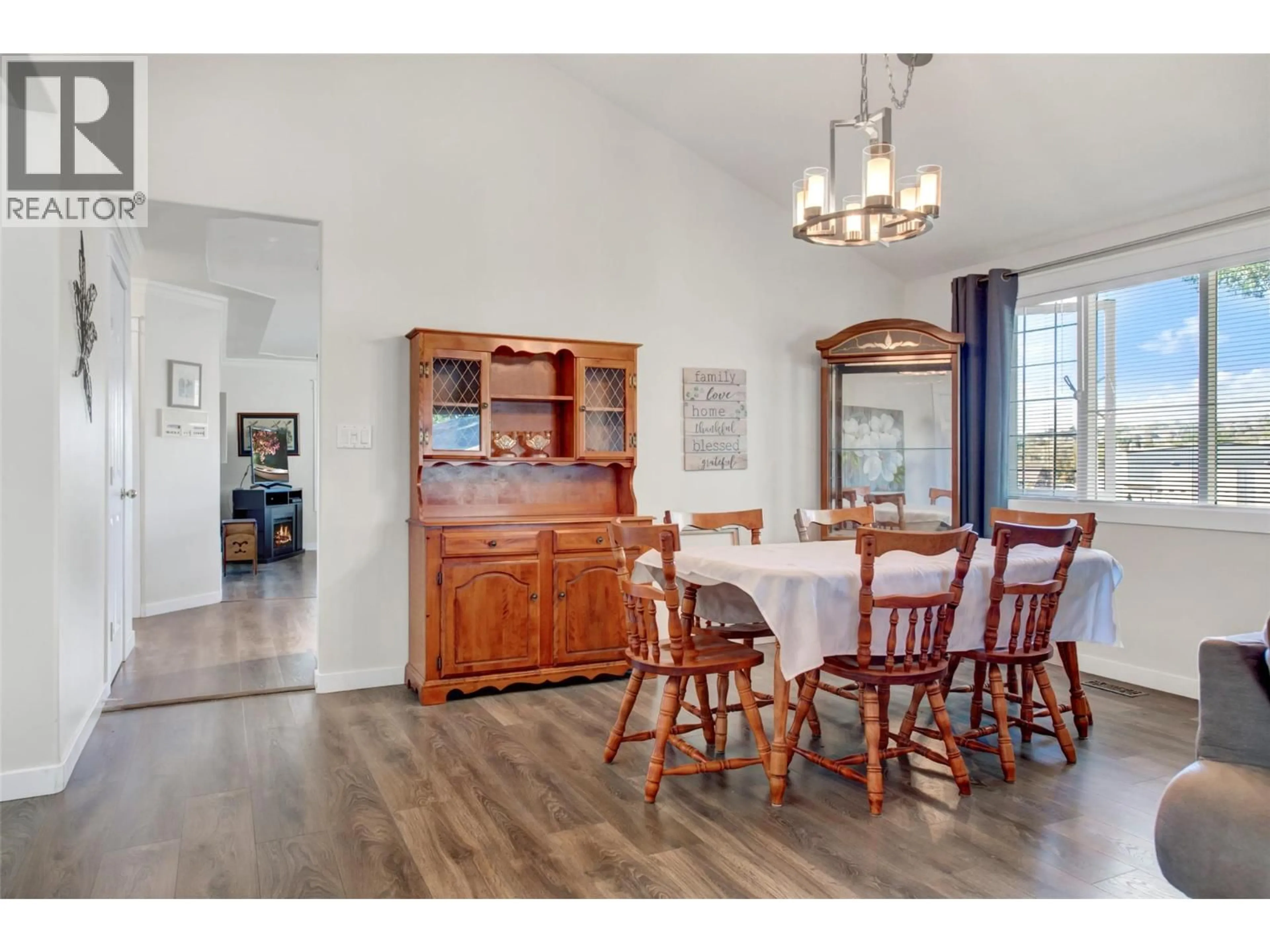 Dining room, wood/laminate floor for 73 - 1400 14 AVENUE, Vernon British Columbia V1B2S9