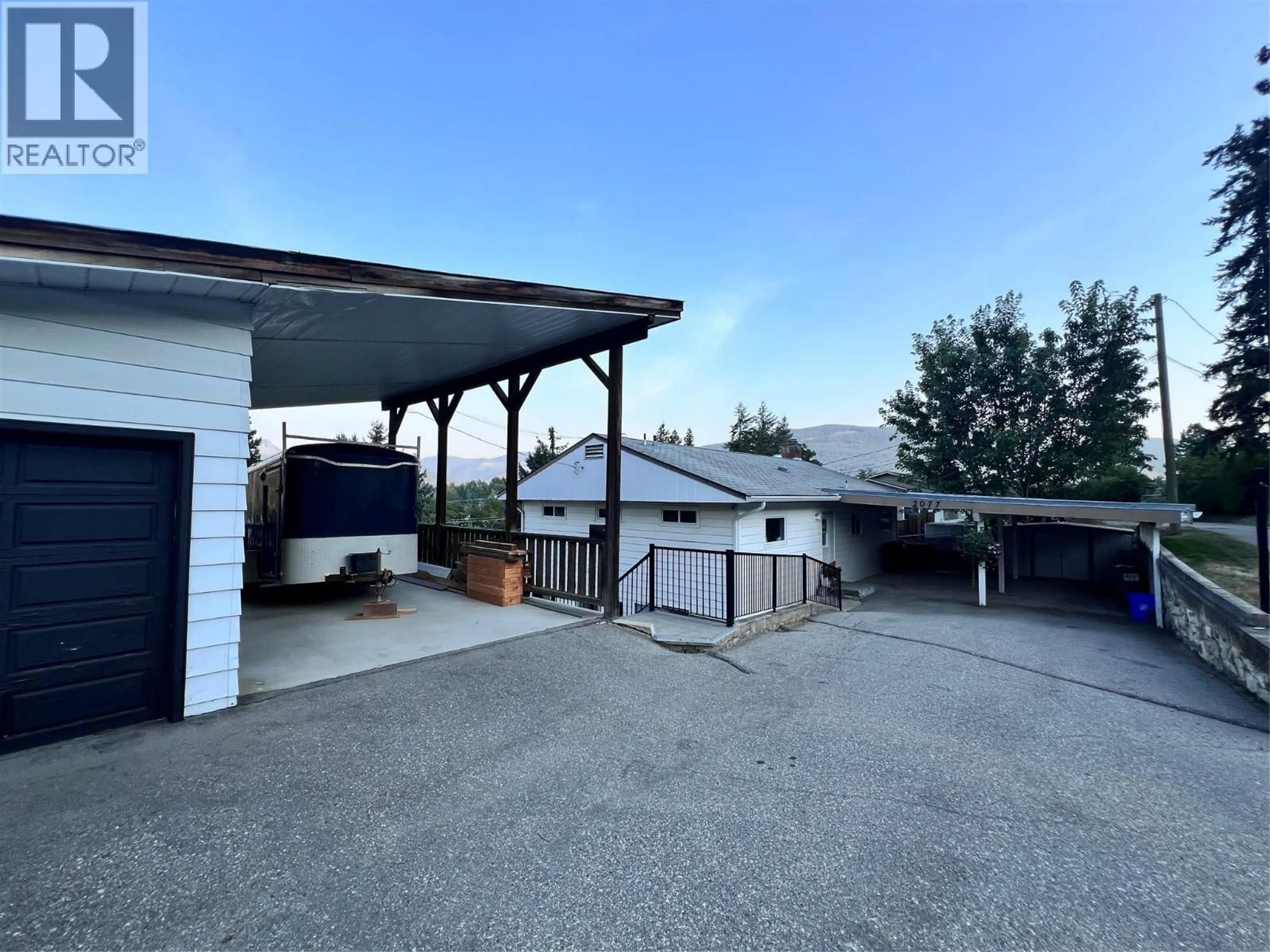 A pic from outside/outdoor area/front of a property/back of a property/a pic from drone, unknown for 2077 DERRY LANE, Lumby British Columbia V0E2G0