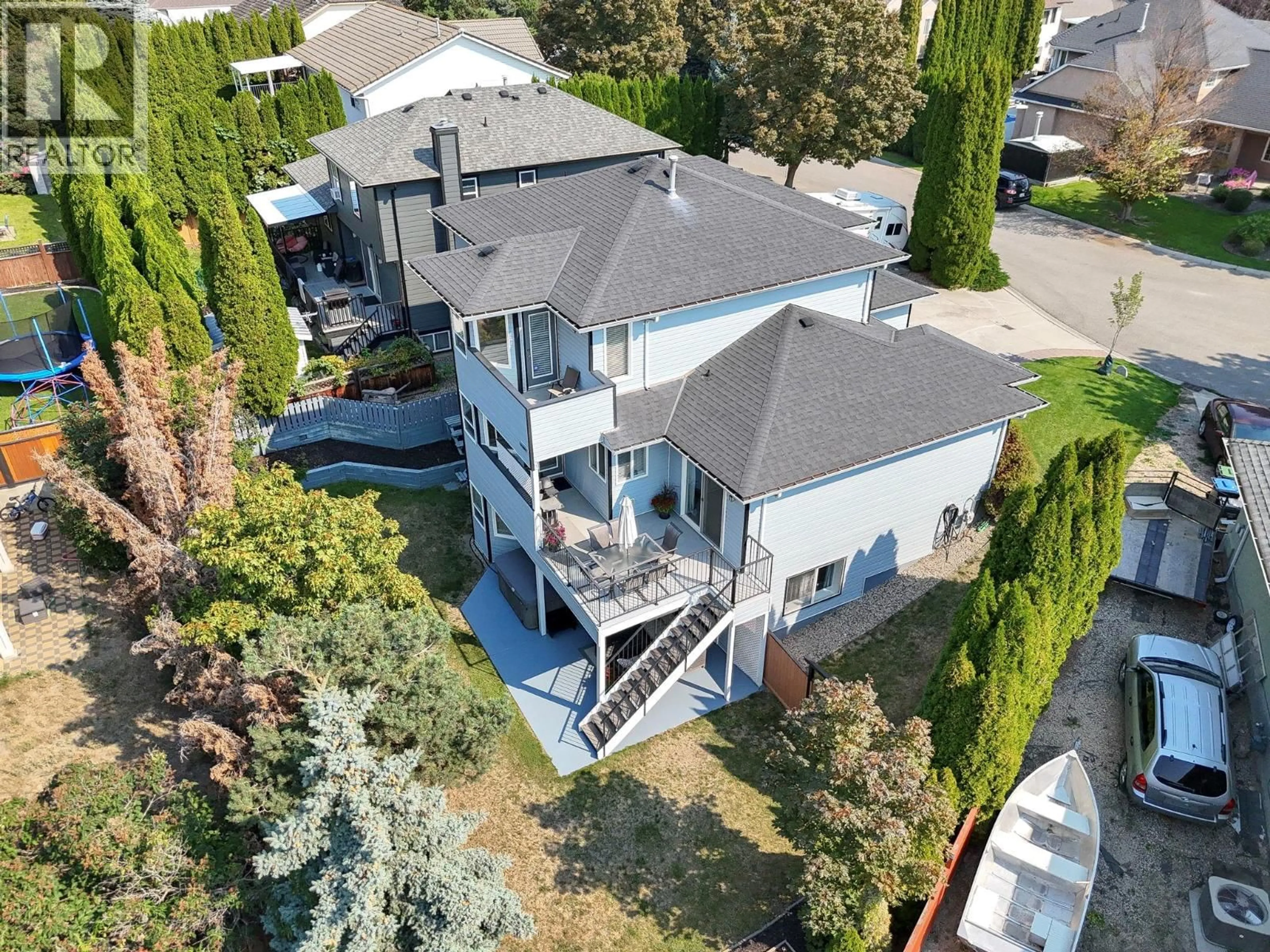 A pic from outside/outdoor area/front of a property/back of a property/a pic from drone, unknown for 1861 GLENHAVEN CRESCENT, Kelowna British Columbia V1V1T4