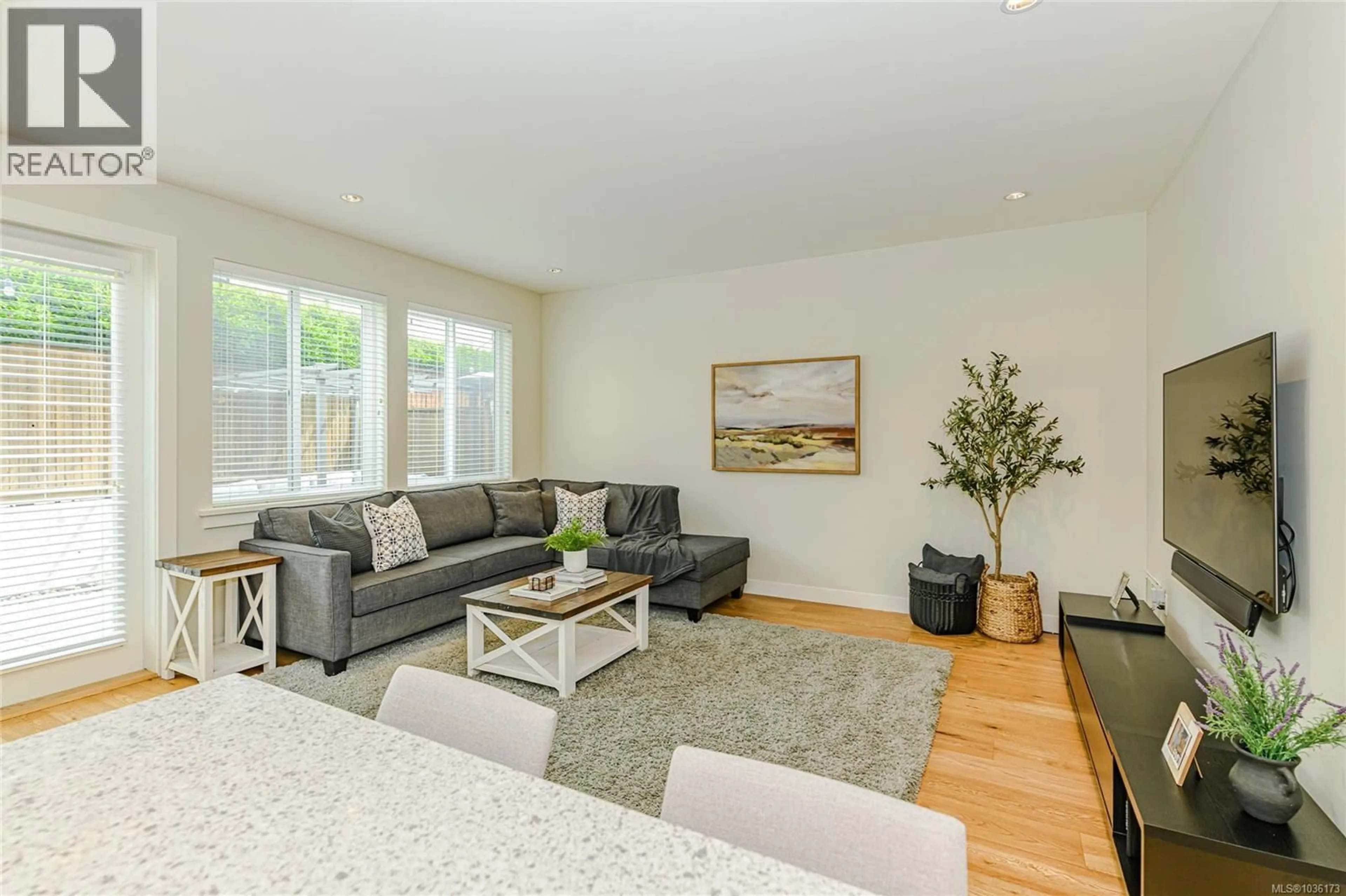 Living room with furniture, wood/laminate floor for 2922 BURLINGTON CRESCENT, Langford British Columbia V9B0K6