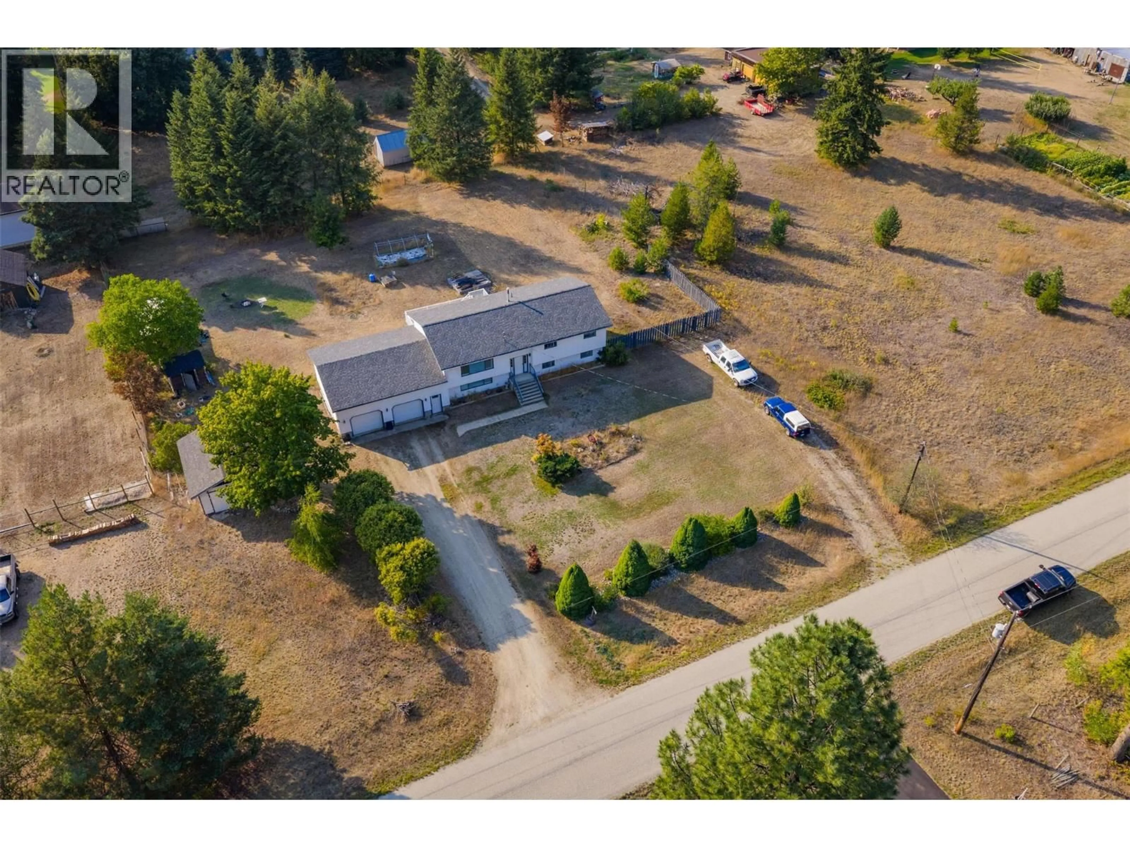 A pic from outside/outdoor area/front of a property/back of a property/a pic from drone, street for 2525 ALEXIS ROAD, Castlegar British Columbia V1N4P6