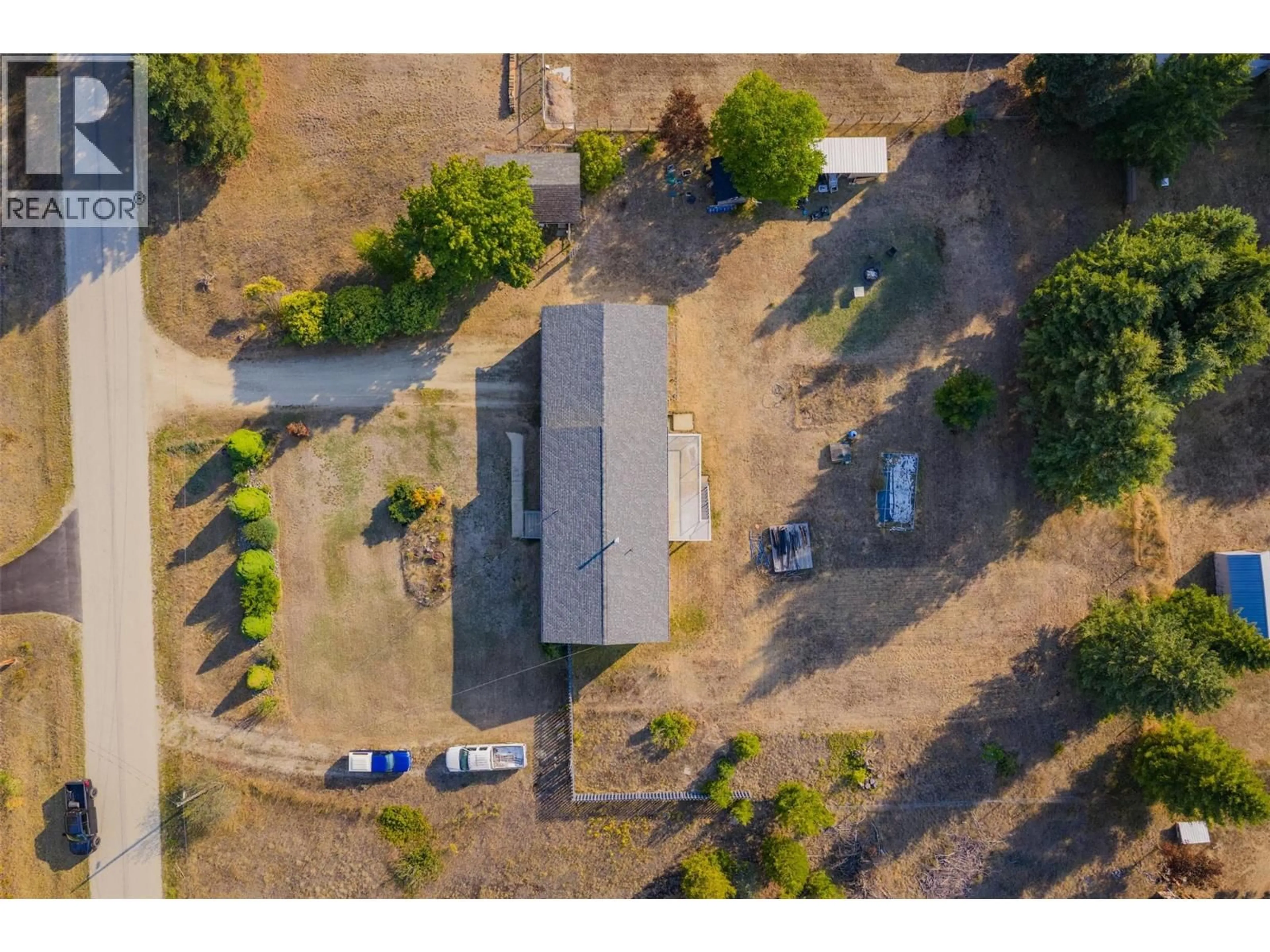 A pic from outside/outdoor area/front of a property/back of a property/a pic from drone, street for 2525 ALEXIS ROAD, Castlegar British Columbia V1N4P6