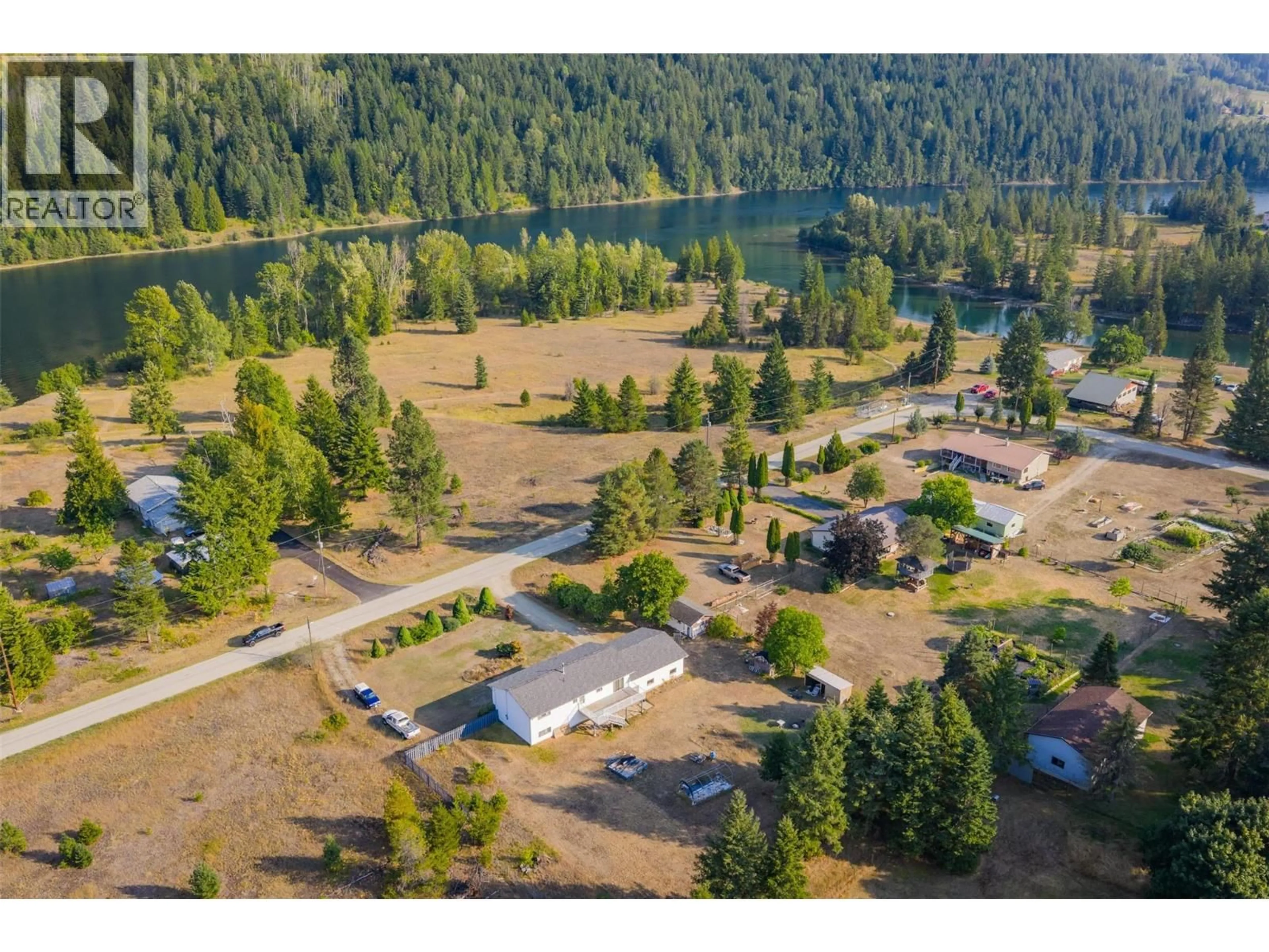 A pic from outside/outdoor area/front of a property/back of a property/a pic from drone, water/lake/river/ocean view for 2525 ALEXIS ROAD, Castlegar British Columbia V1N4P6