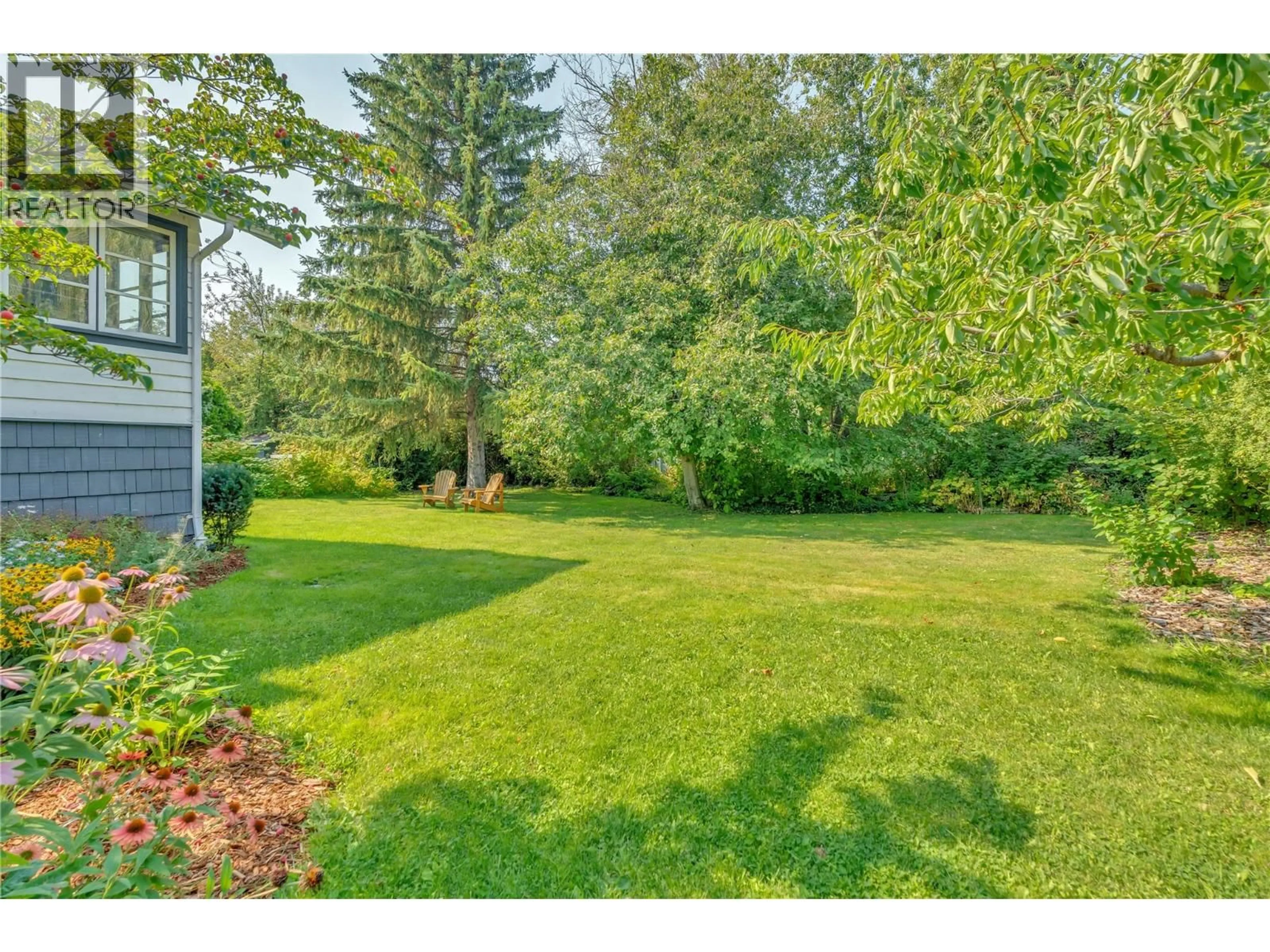 A pic from outside/outdoor area/front of a property/back of a property/a pic from drone, forest/trees view for 480 ROBINSON AVENUE, Naramata British Columbia V0H1N0